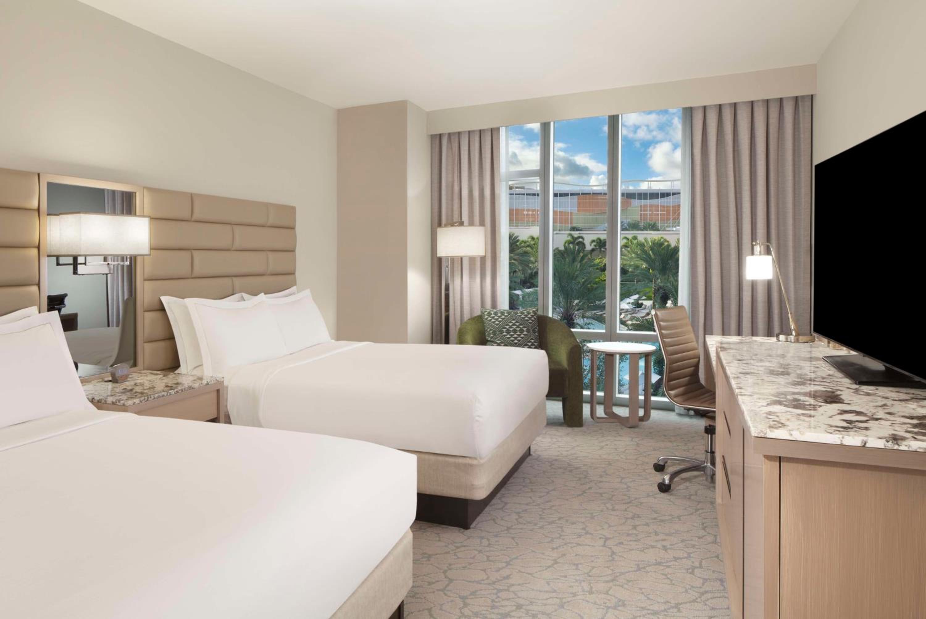 Deluxe Queen Room with Two Queen Beds with Pool View