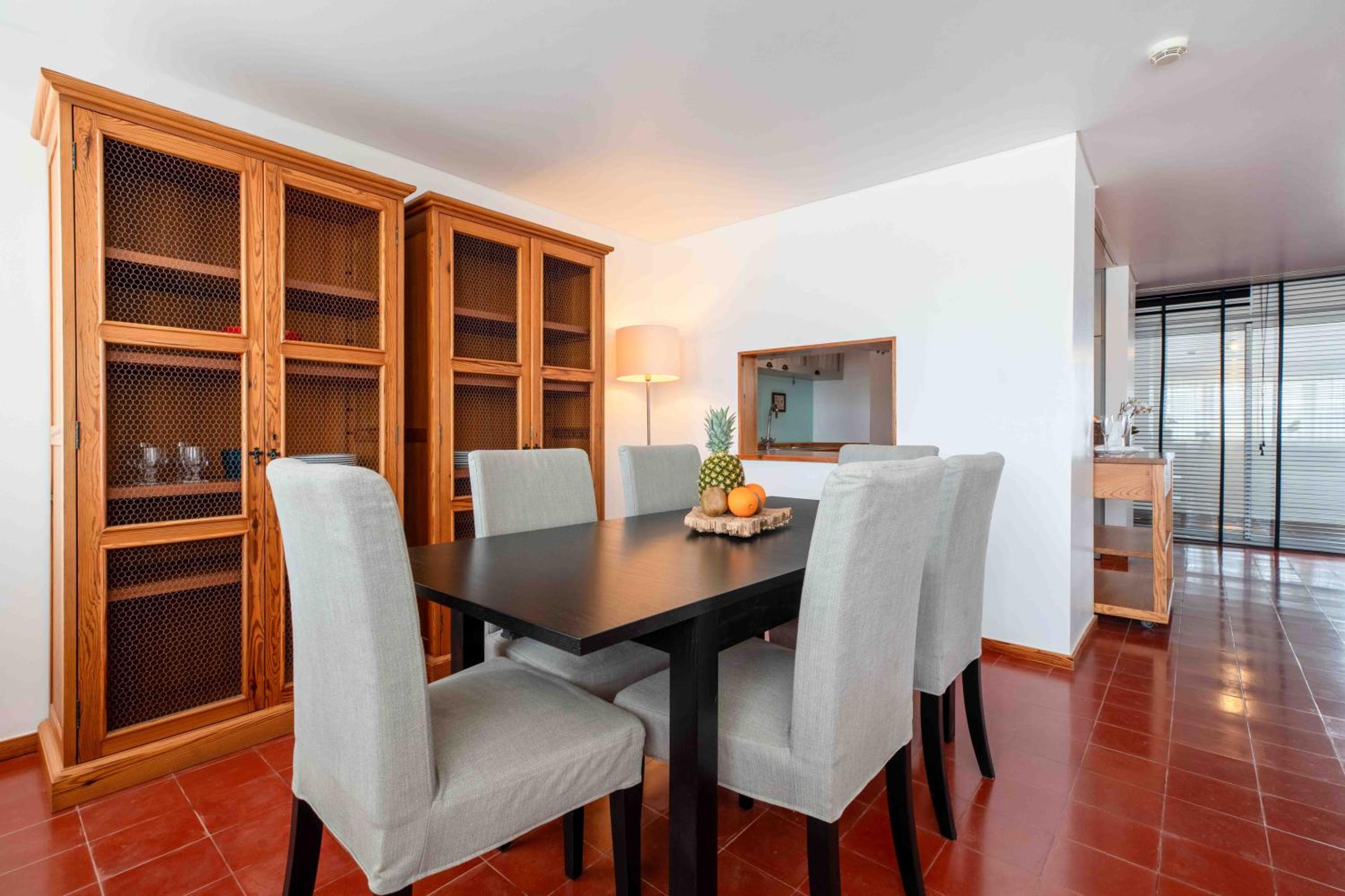 Three-Bedroom Apartment with Balcony and Pool View