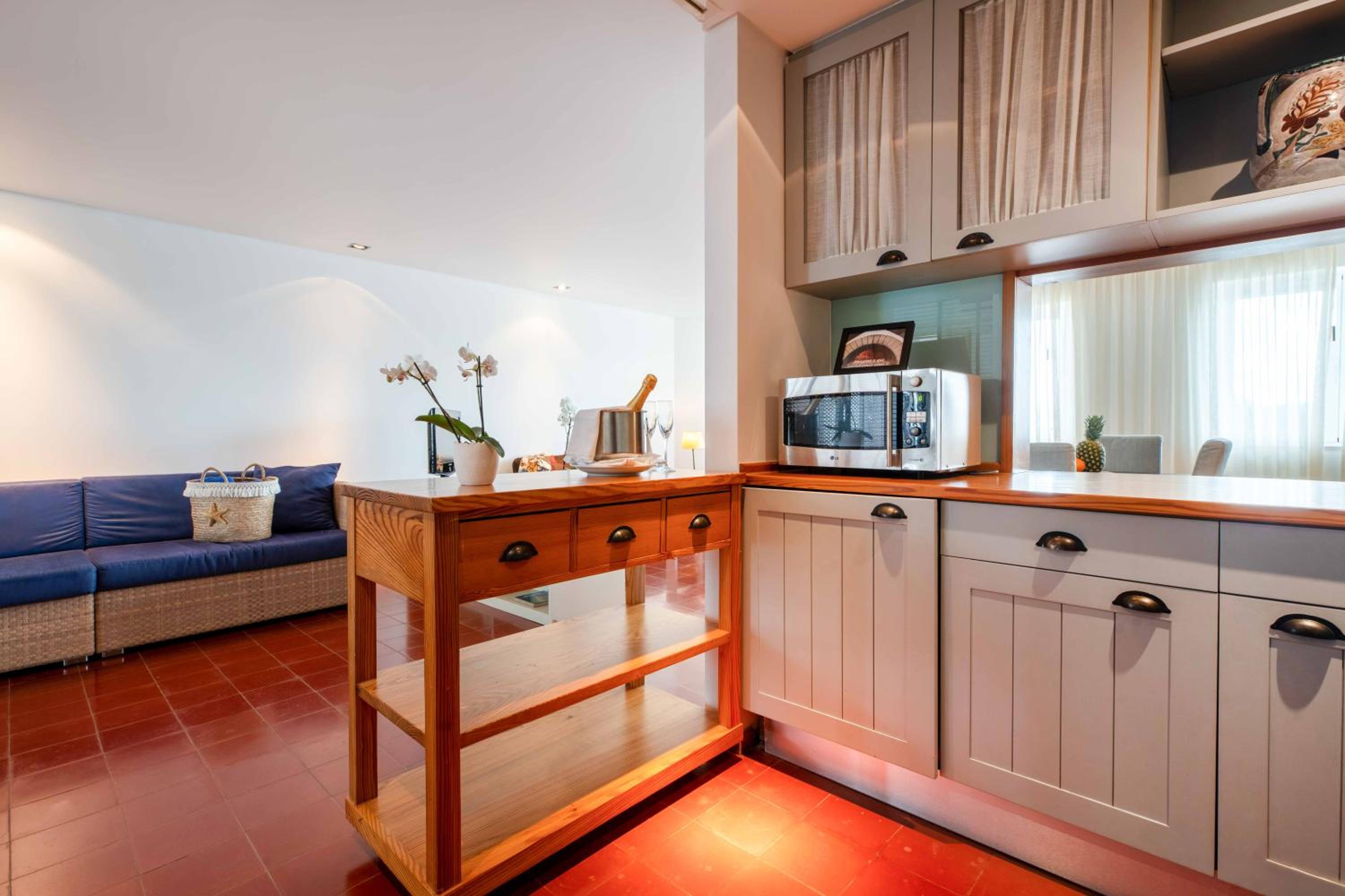 Three-Bedroom Apartment with Balcony and Pool View