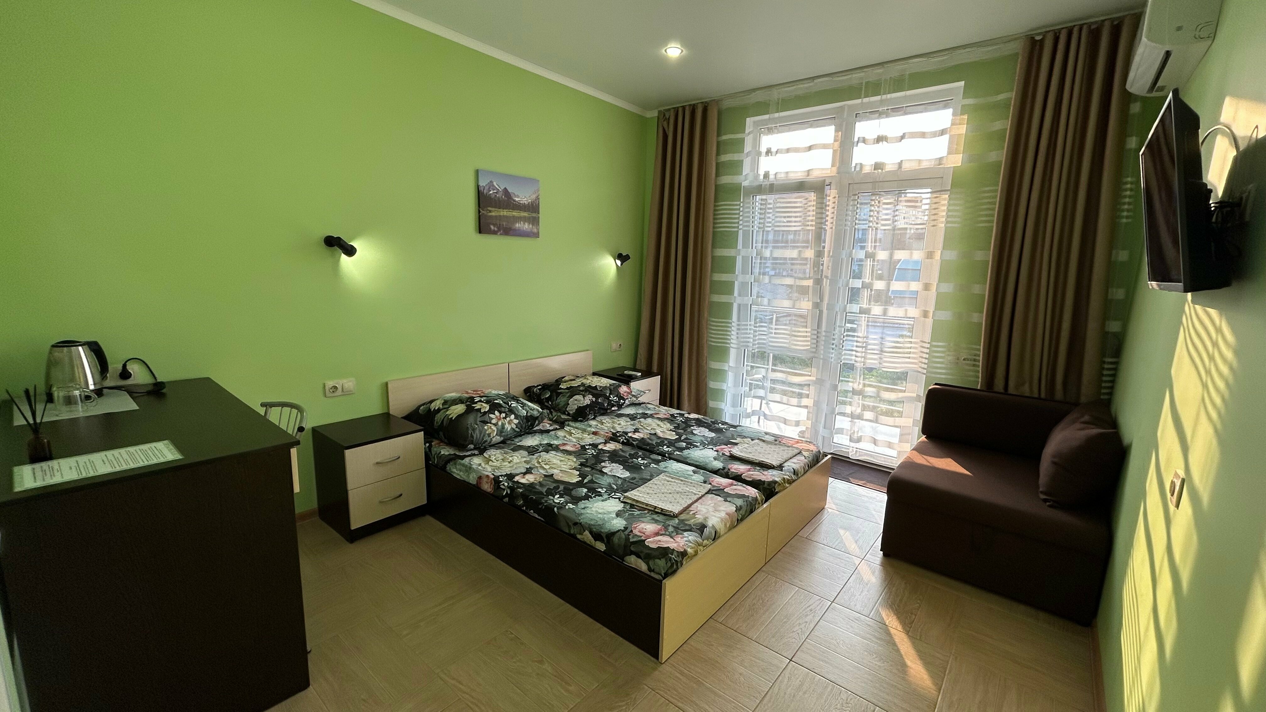 Двухместный номер с 2 отдельными кроватями и балконом