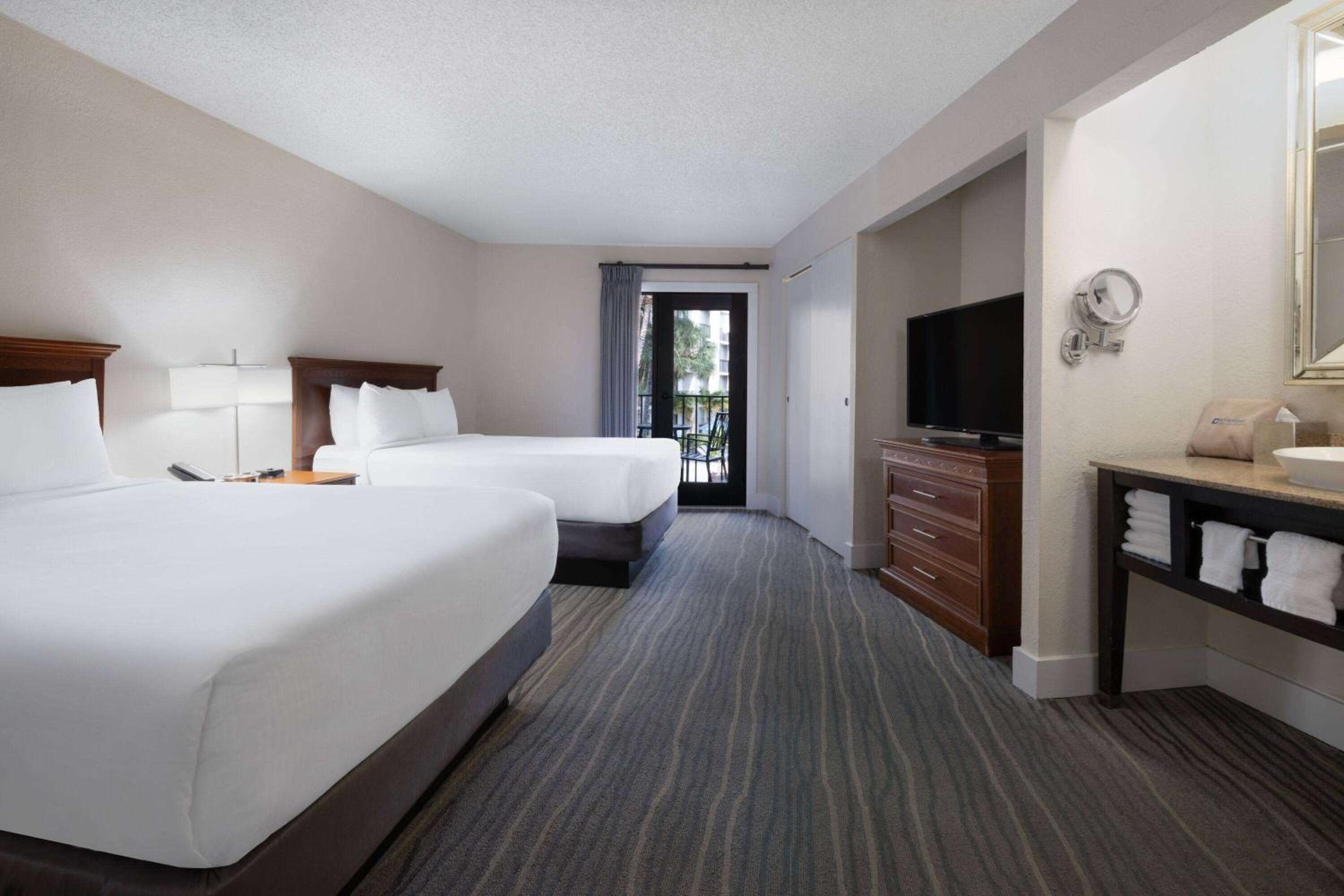 Studio Suite with Two Double Beds and Pool View - Non-Smoking