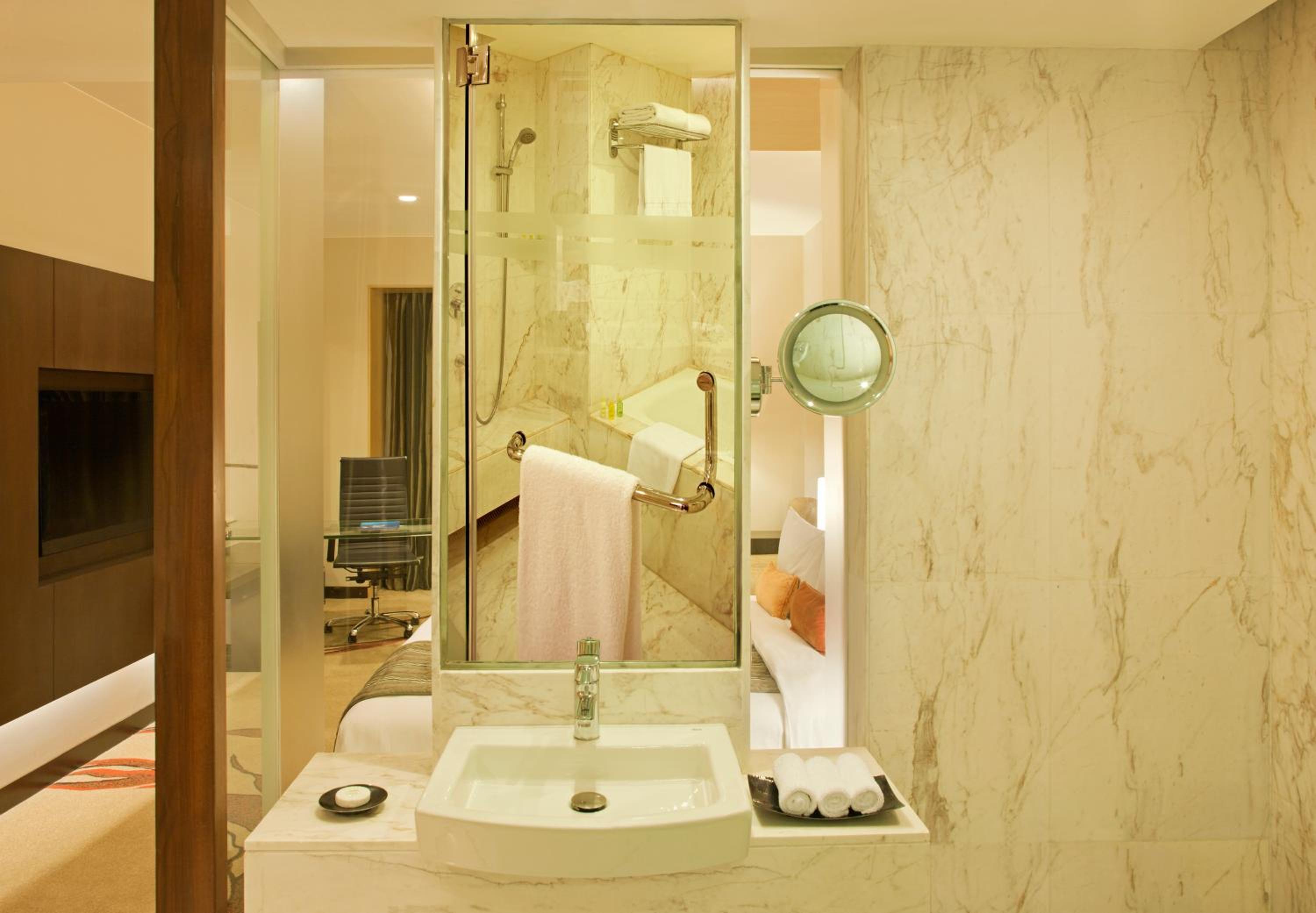 Business Class Room (Shuttle service to Golden Temple on scheduled Hrs, 10% Discount on Food & Soft Beverages, Happy Hours 1+1 on IMFL Drinks (16:00-18:00 Hrs) at Proof Patio Bar