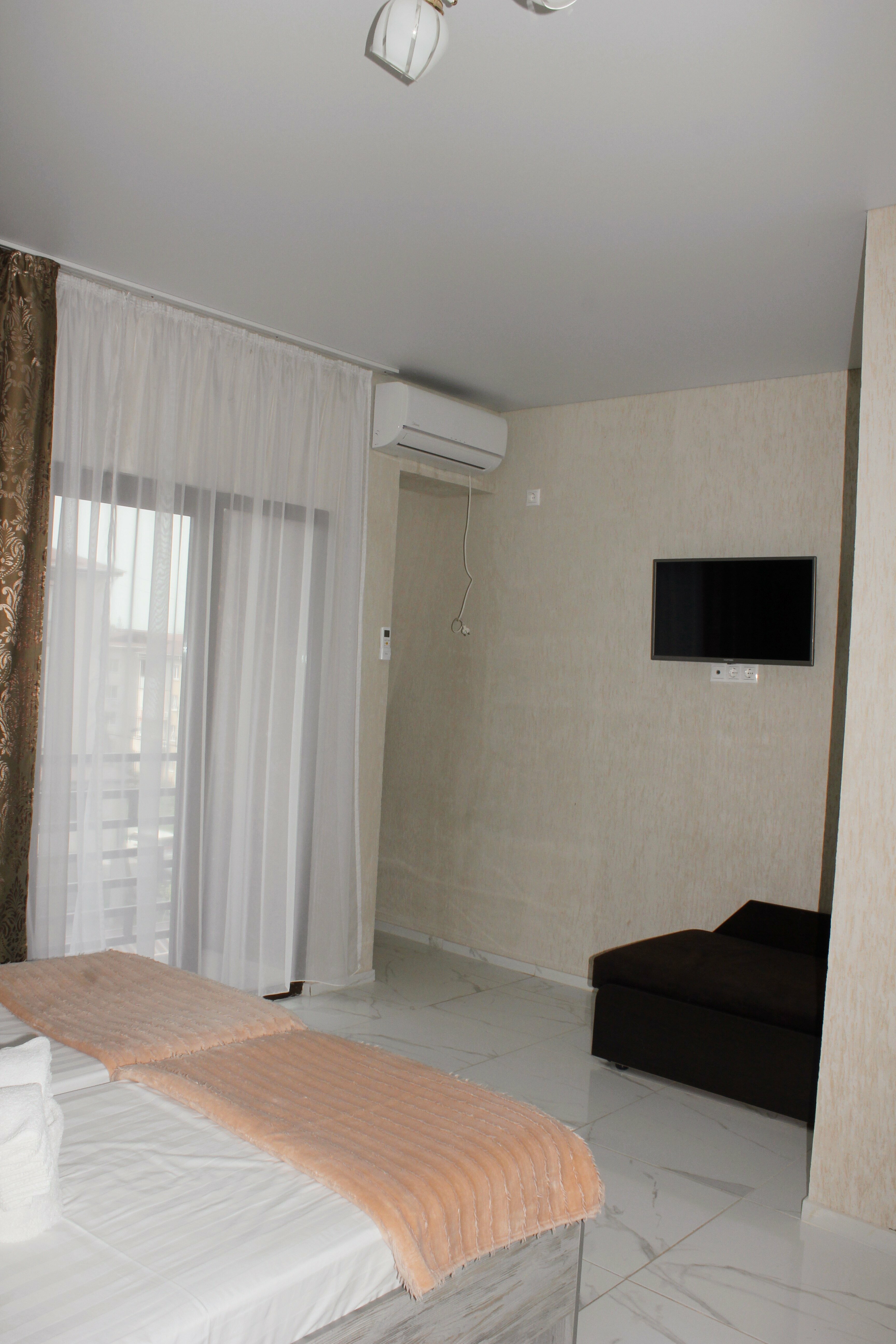 комфорт с балконом вид на дома