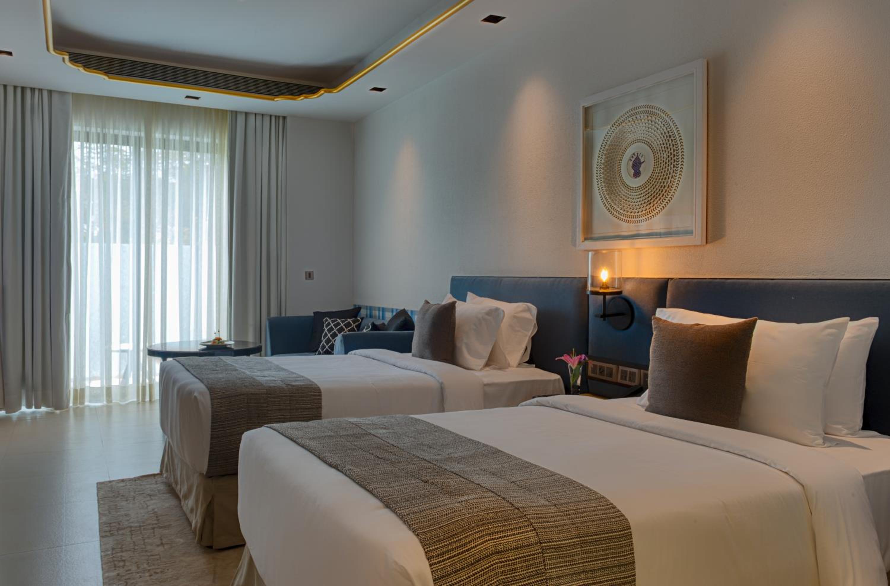 Premium Balcony Room Twin Bed - INR 2000 Meal Credit per stay, 20% discount on Spa & Laundry