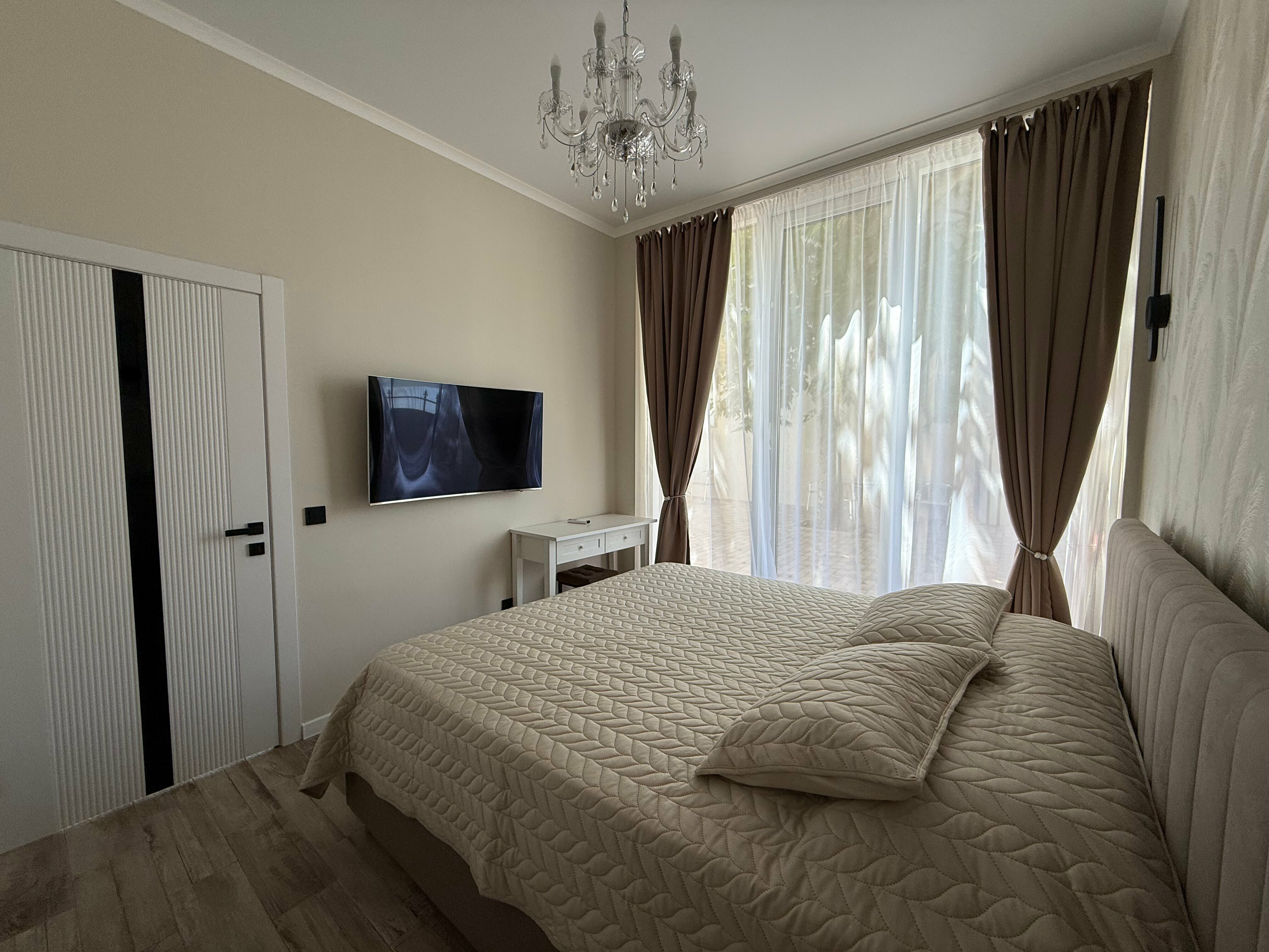 Номер-студия Делюкс с кроватью размера «queen-size»