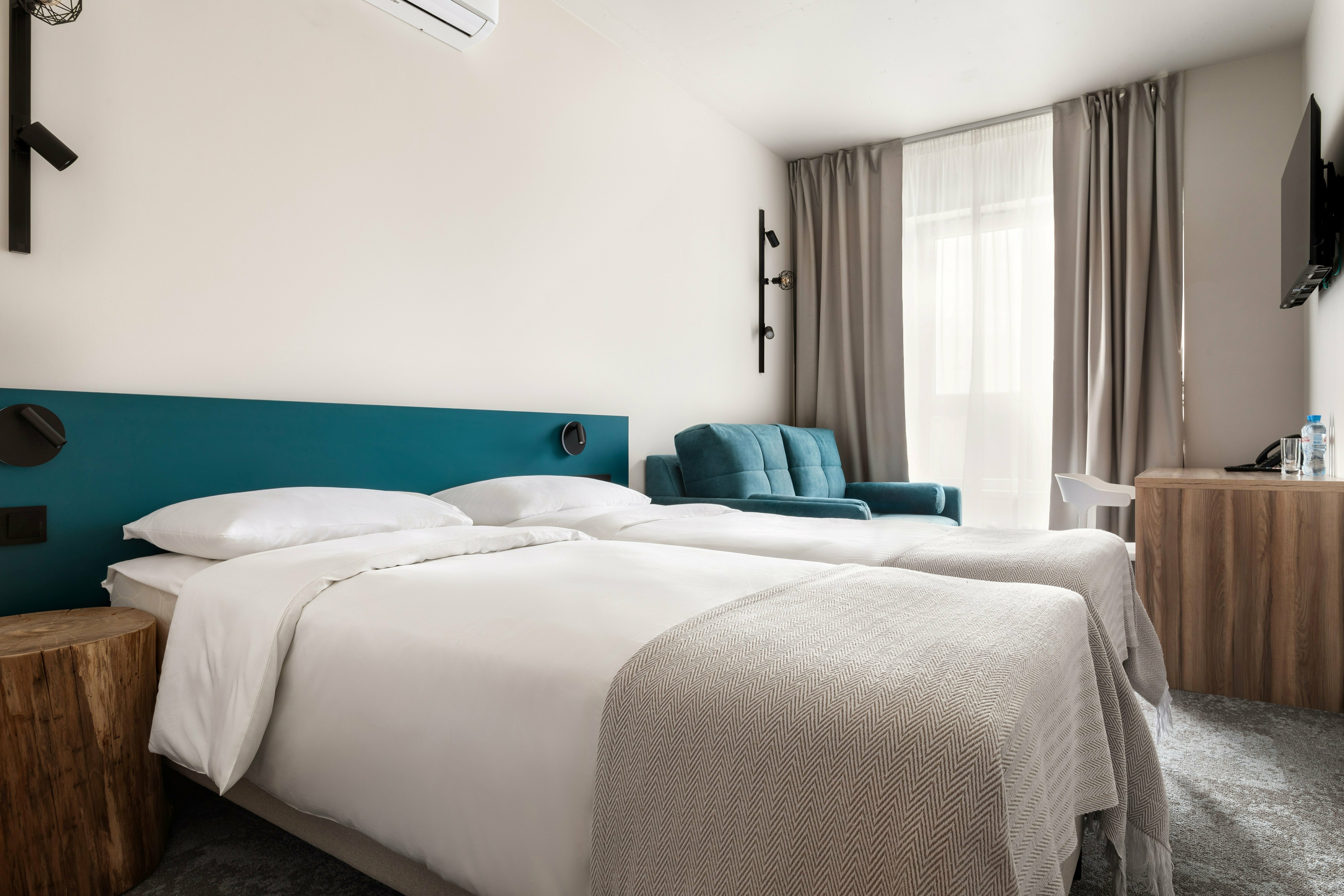 Семейный Супериор с 1 кроватью Queen-size или 2 односпальными кроватями 80х200см