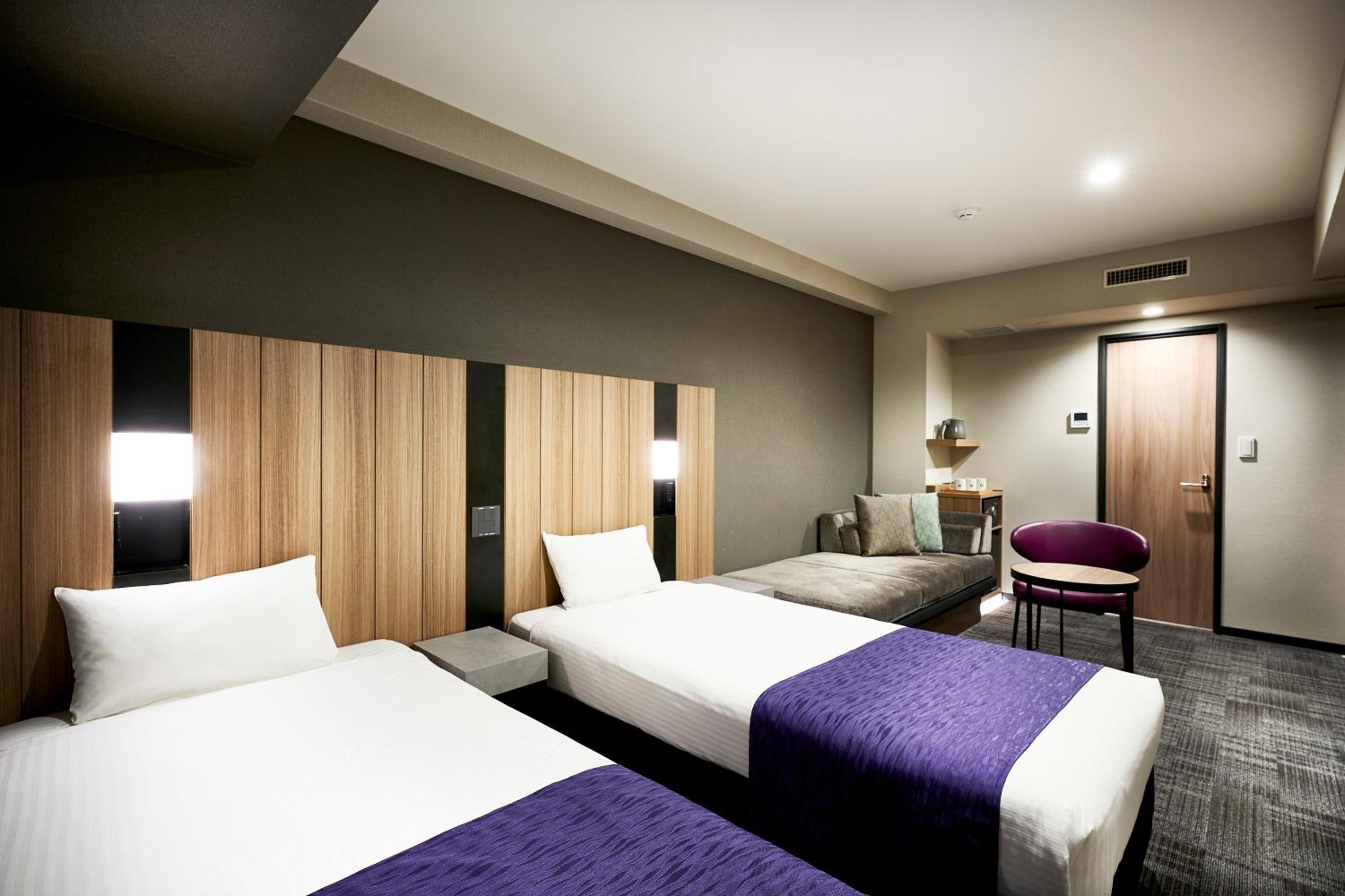 Deluxe Twin Room with Sofa Bed and Bath Tub