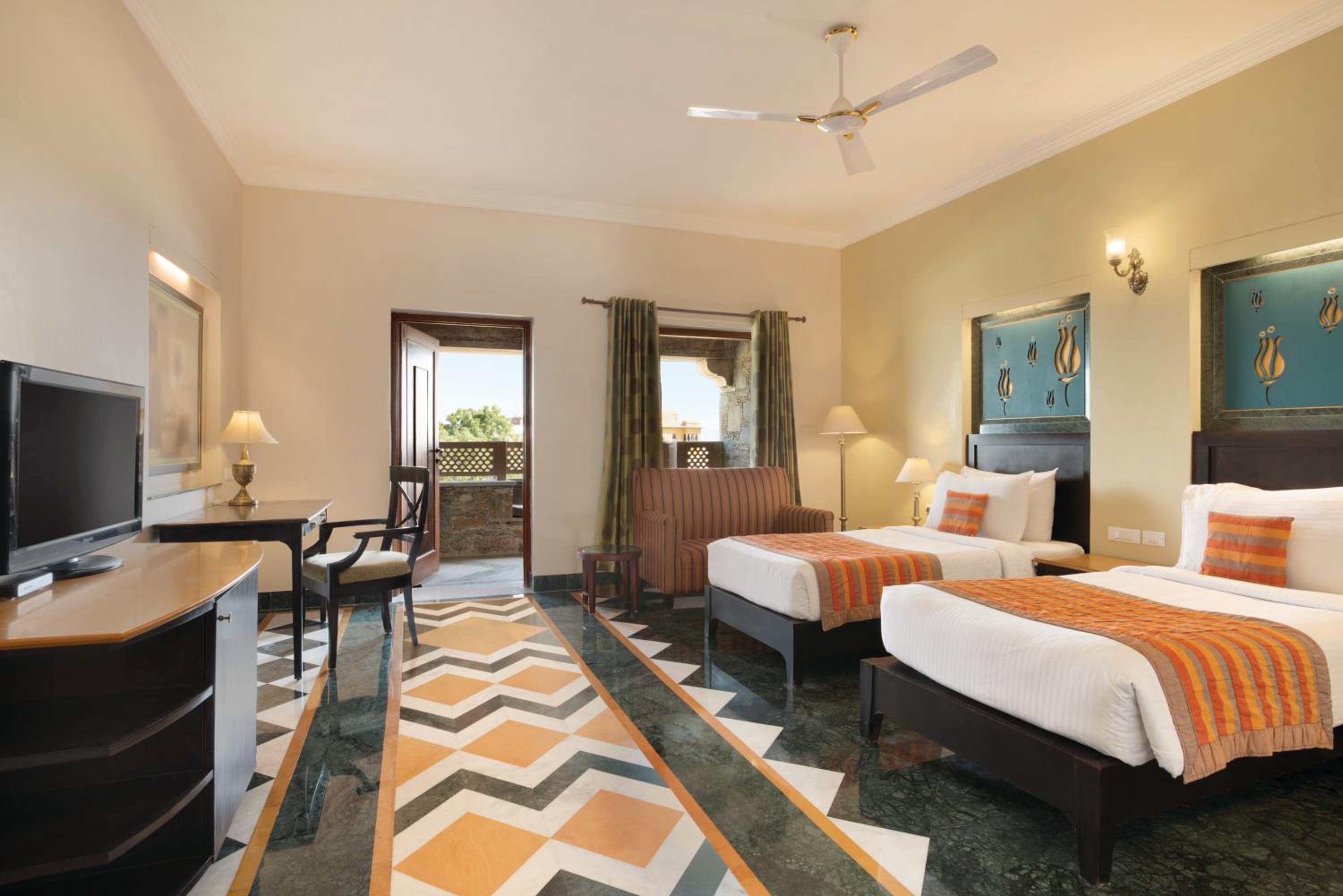 Super Deluxe Room with Private Sitout,Garden & City View : 15% off on F&B, 10% off on Spa, Happy Hours with 2+1 offer ,Complimentary Welcome Drink on arrival, Signature Activities & Experiences.