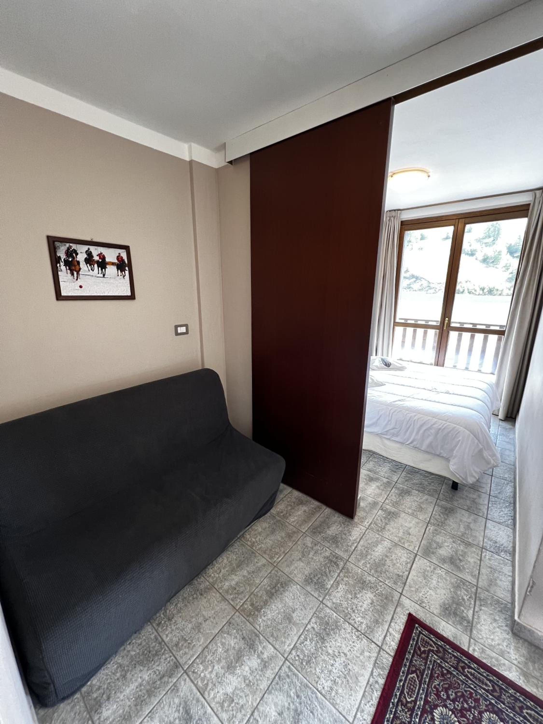 Two-Bedroom Apartment with Balcony and Mountain View