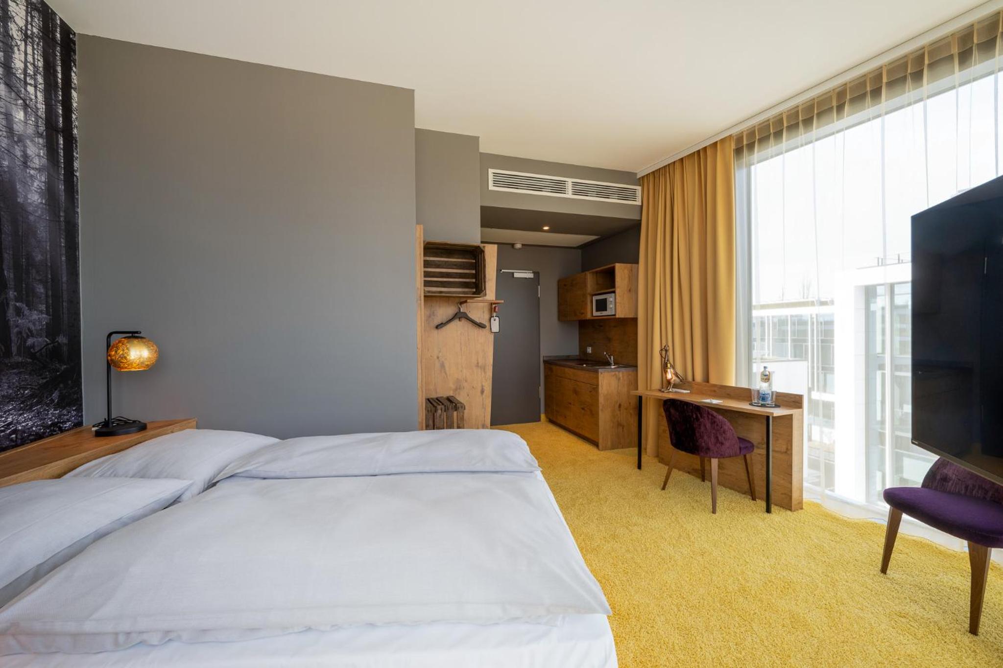 Doppelzimmer „TASTY“ mit Küchenzeile