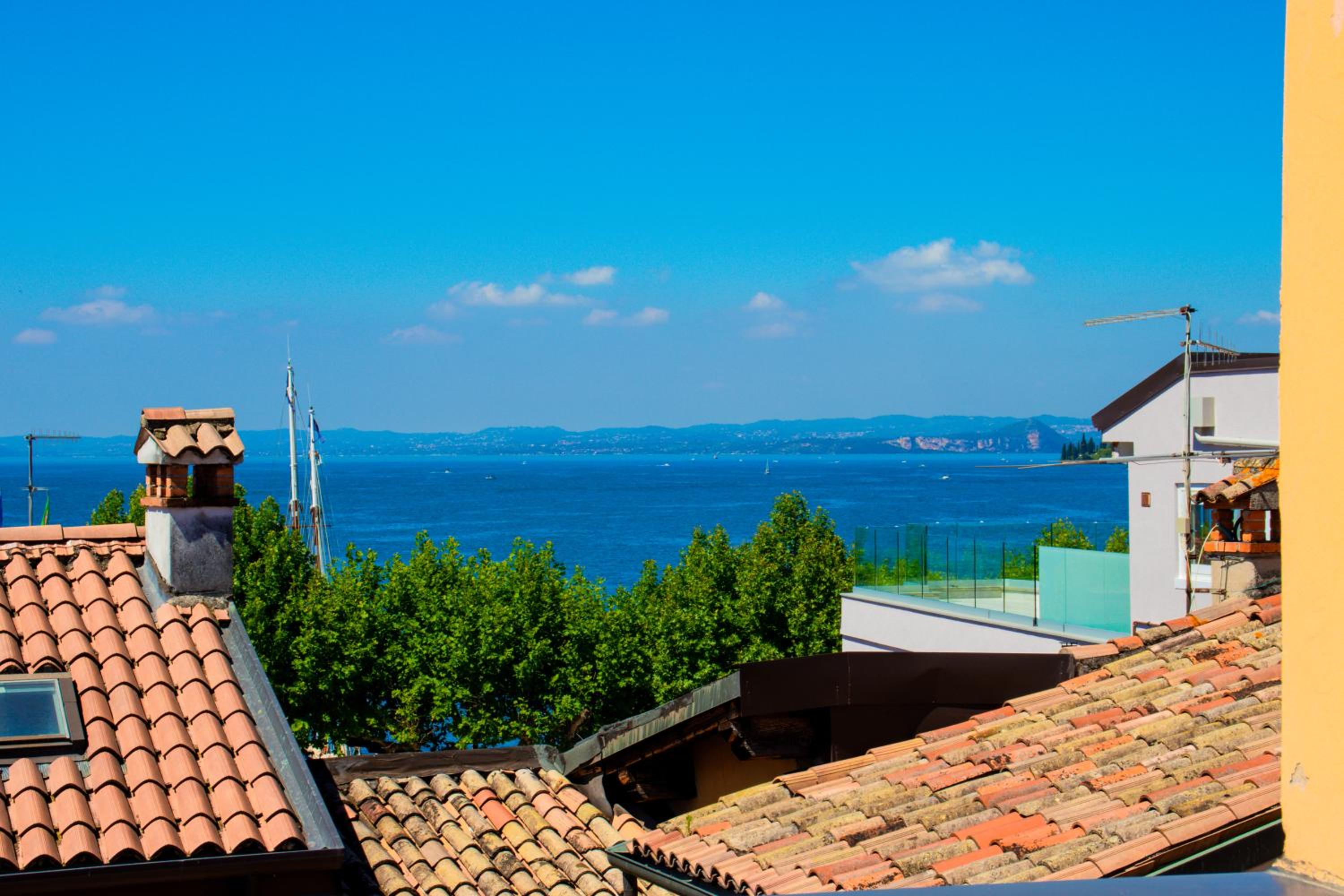 Triple Room with Terrace and Partial Lake View