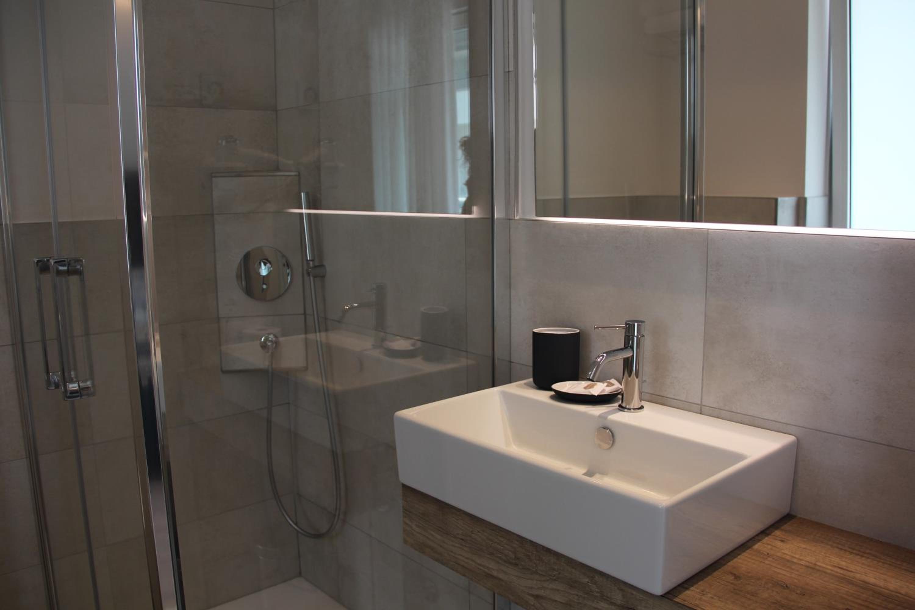 Deluxe Triple Room with Side Sea View