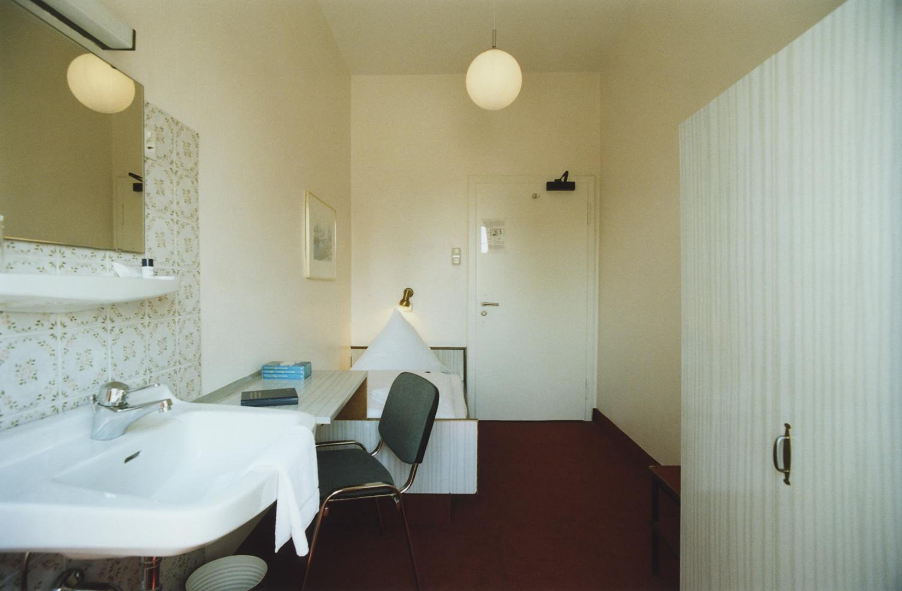 Basic Single Room with Shared Bathroom