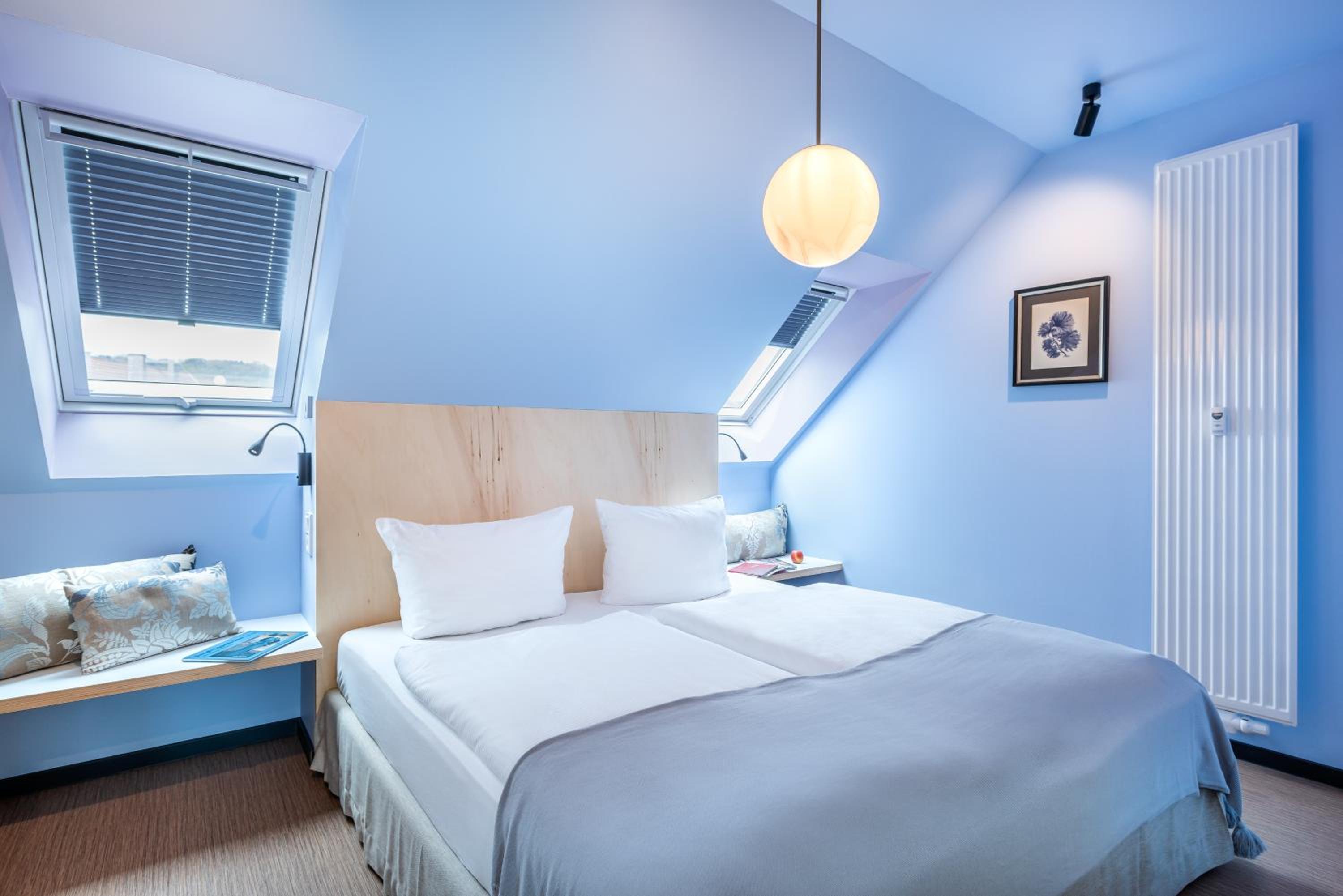 Familienzimmer mit getrennten Schlafzimmern und Klimaanlage