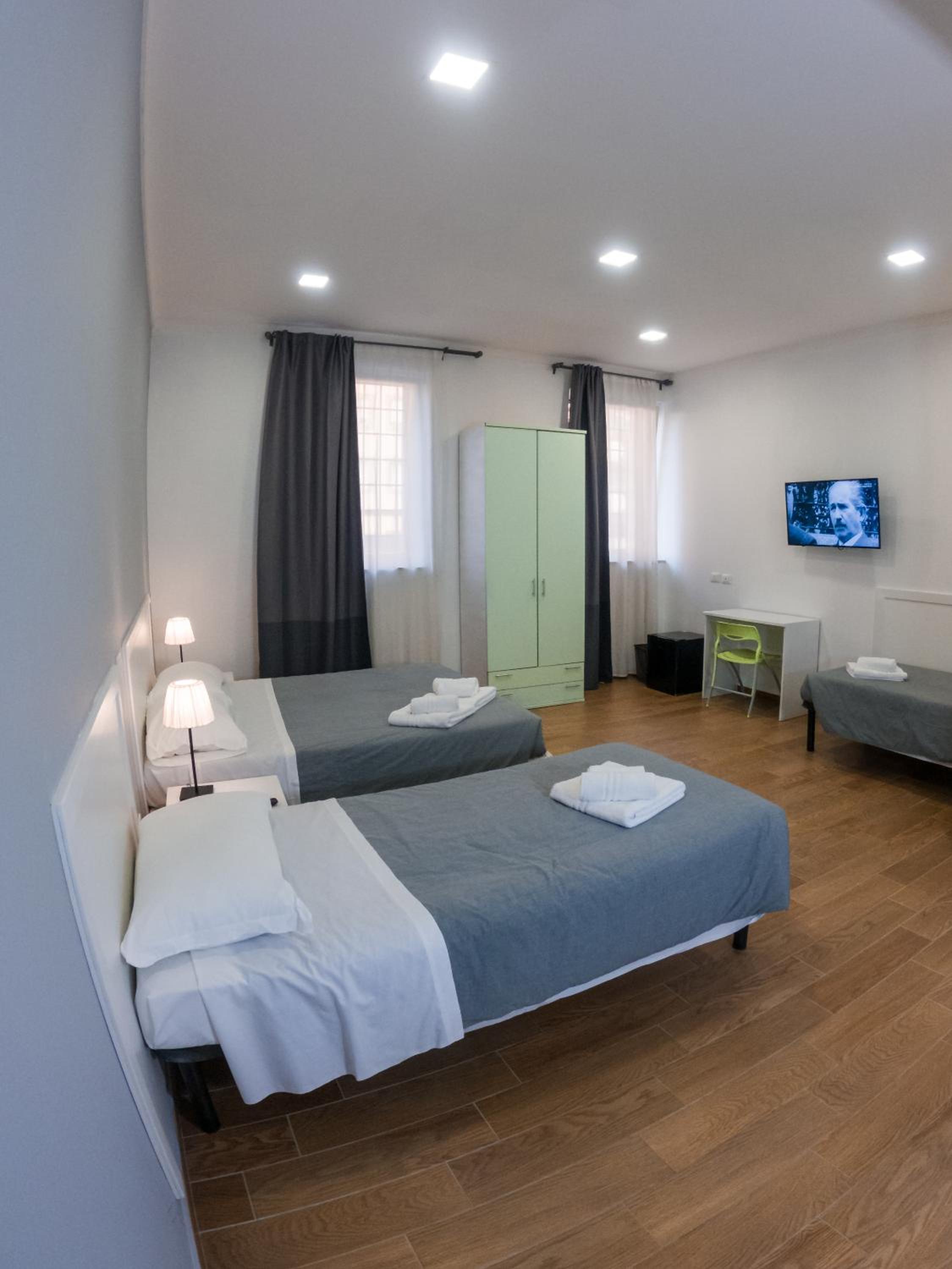 Quadruple Room with Private Bathroom