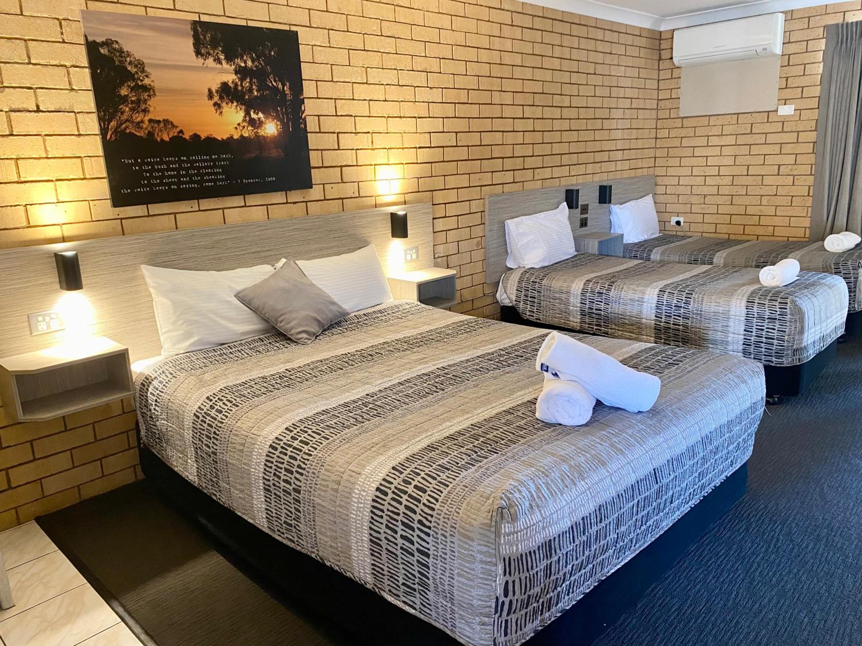 Queen Suite and 2 Singles (Non Pet-Friendly)