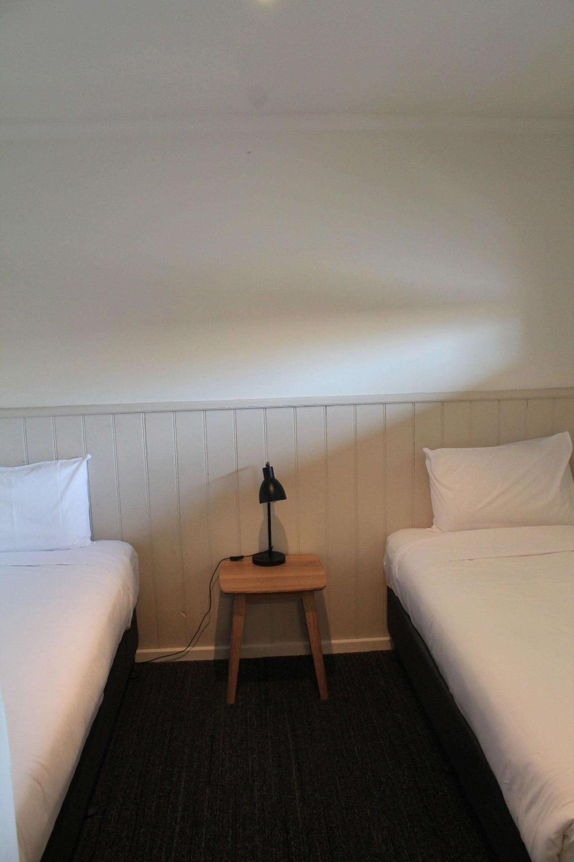 Courtyard Family Room (One King and Two Single Beds)