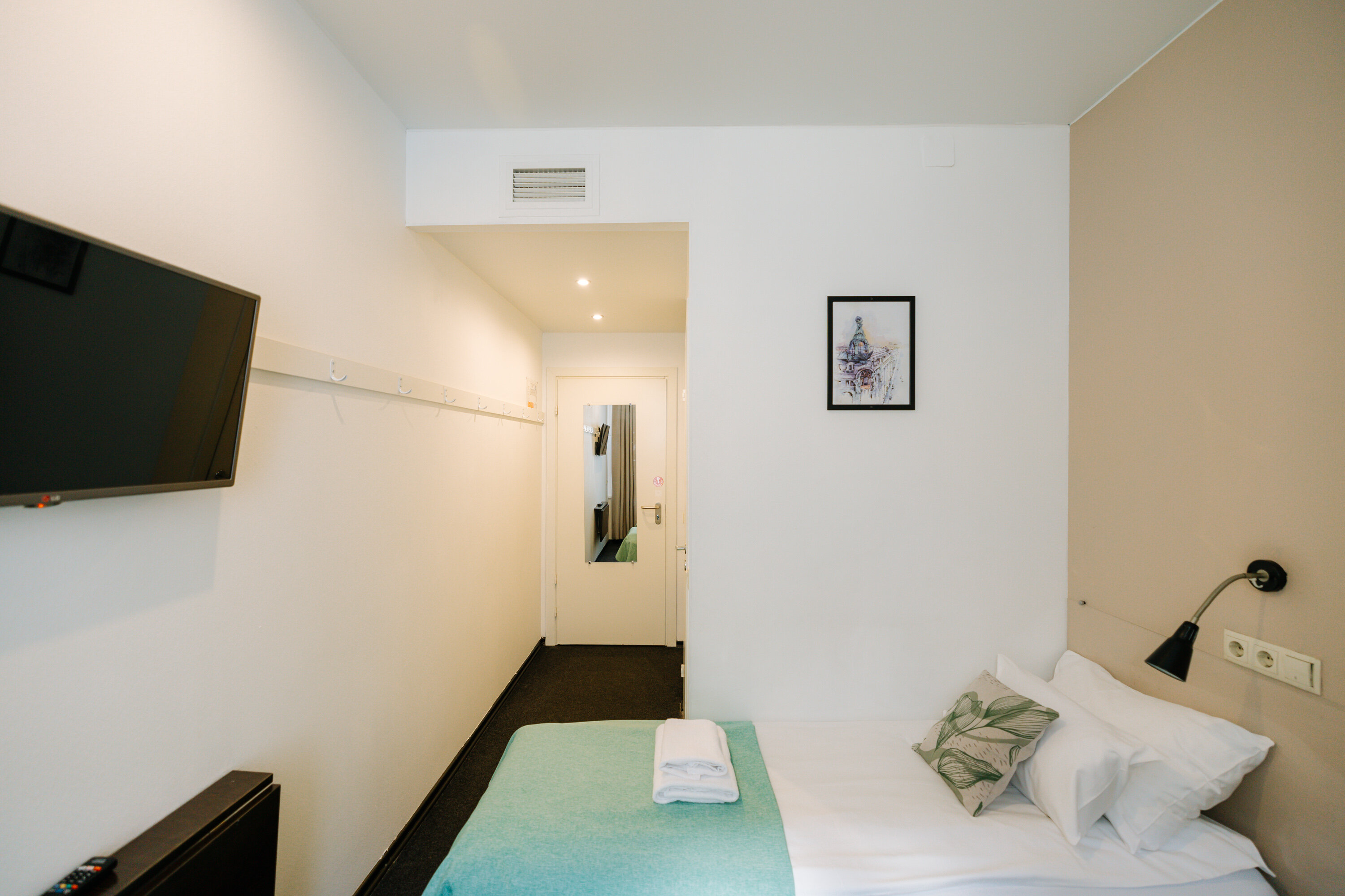 Стандартная двухместная комната с 1 большой или 2 раздельными кроватями