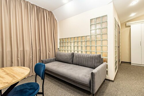 Люкс мансарда с одной двуспальной кроватью с видом на город