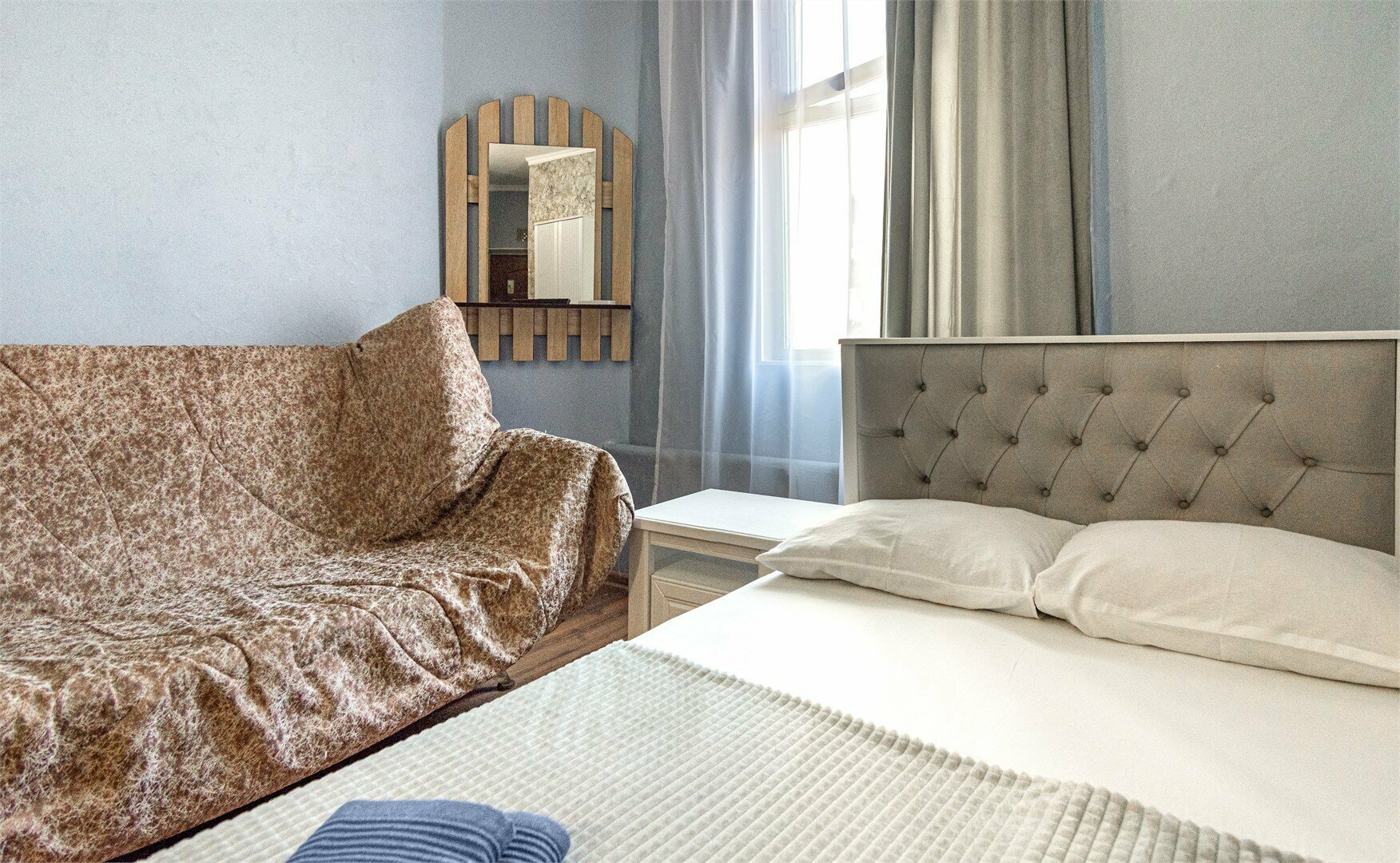 Трехместный номер с видом на сад