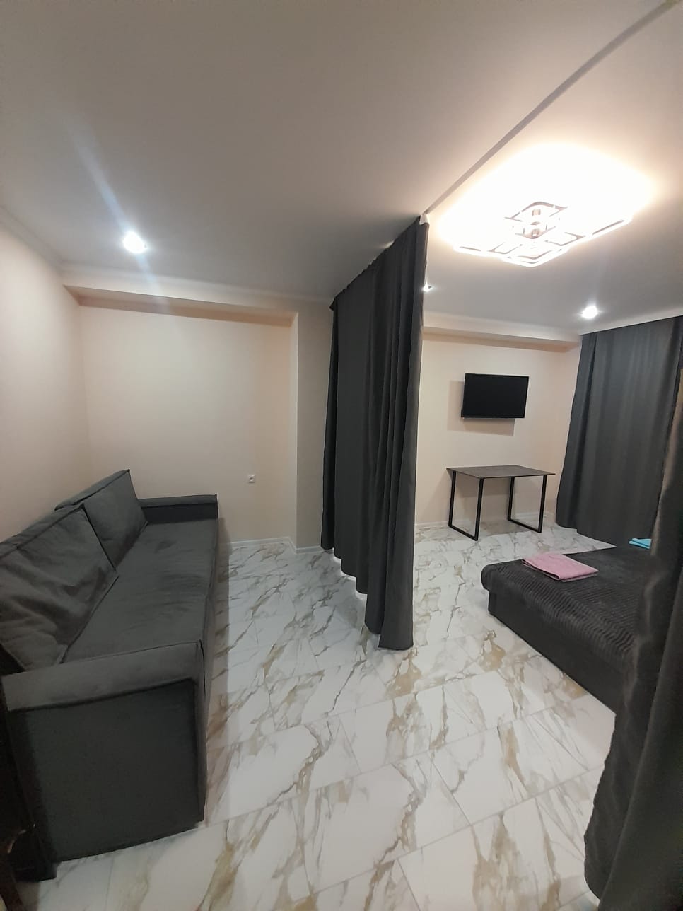 Улучшенный четырехместный номер