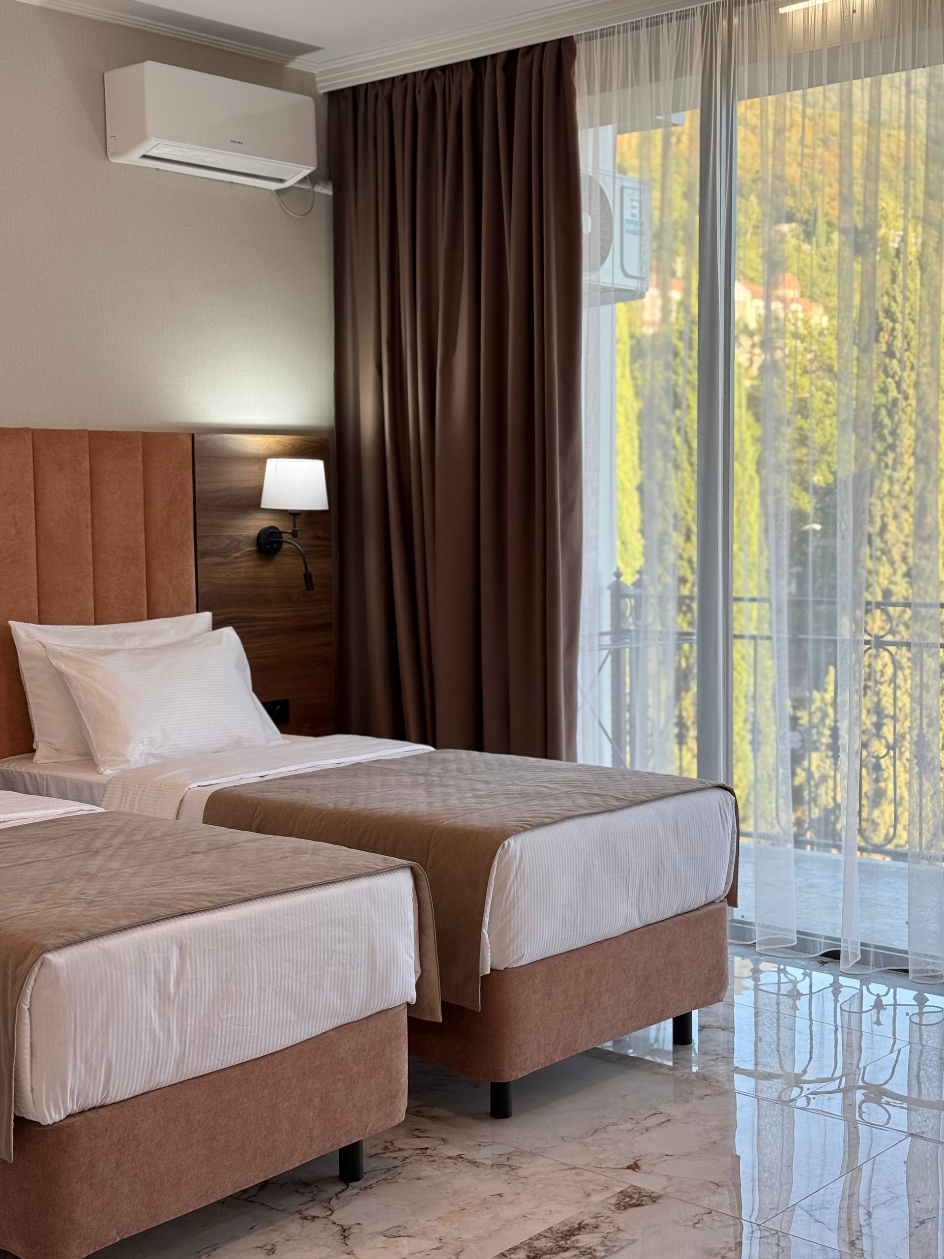 Двухместный номер Делюкс с 1 кроватью или 2 отдельными кроватями и балконом