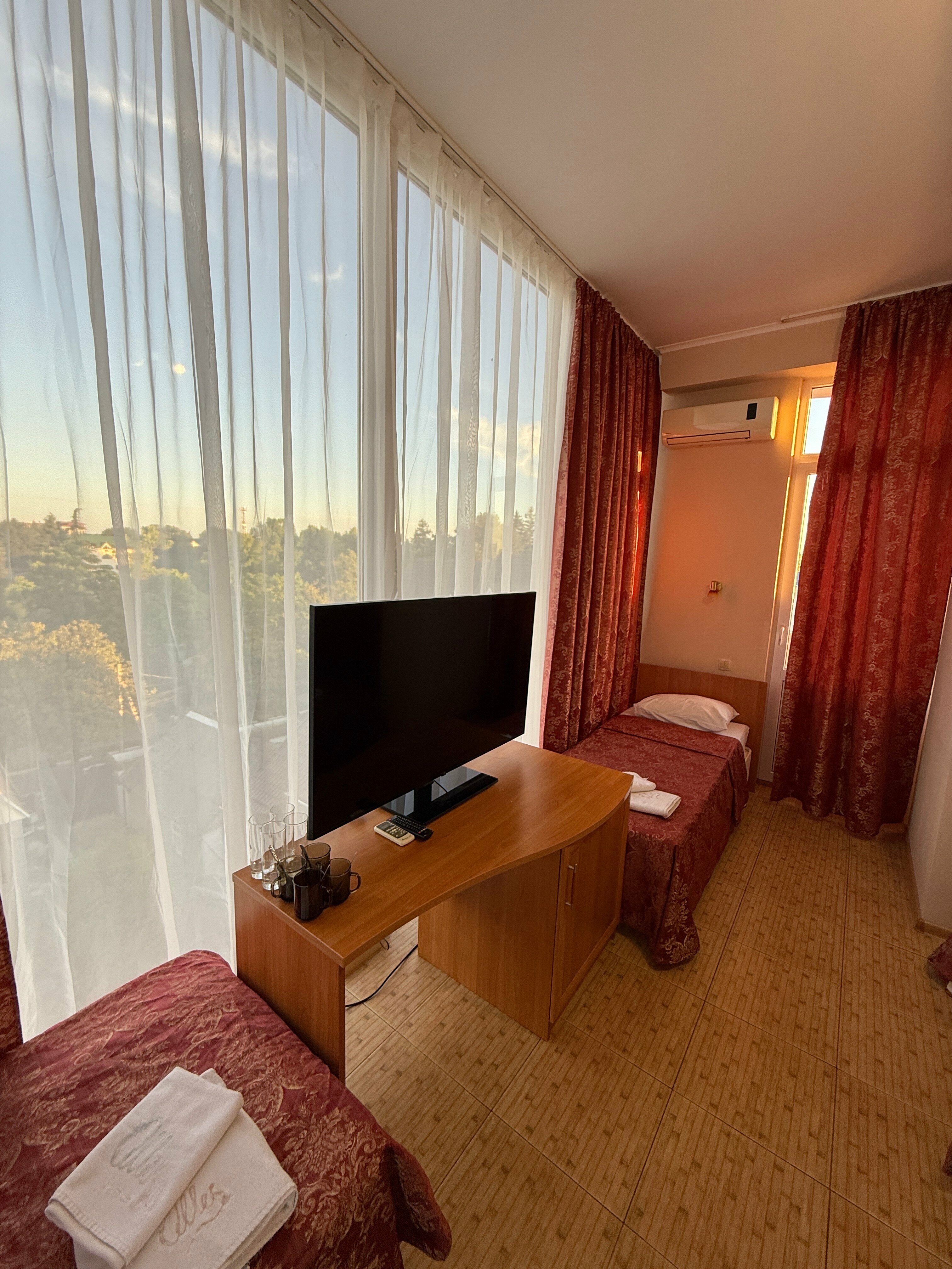 Четырехместный номер с балконом