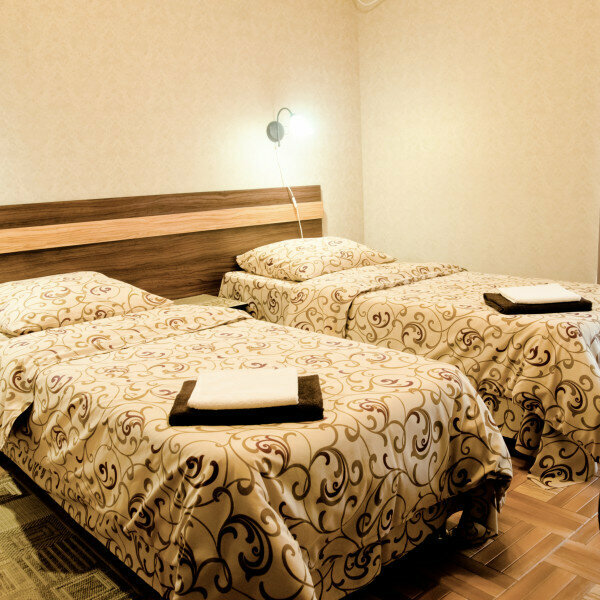 Двухместный стандарт с дополнительным местом и балконом