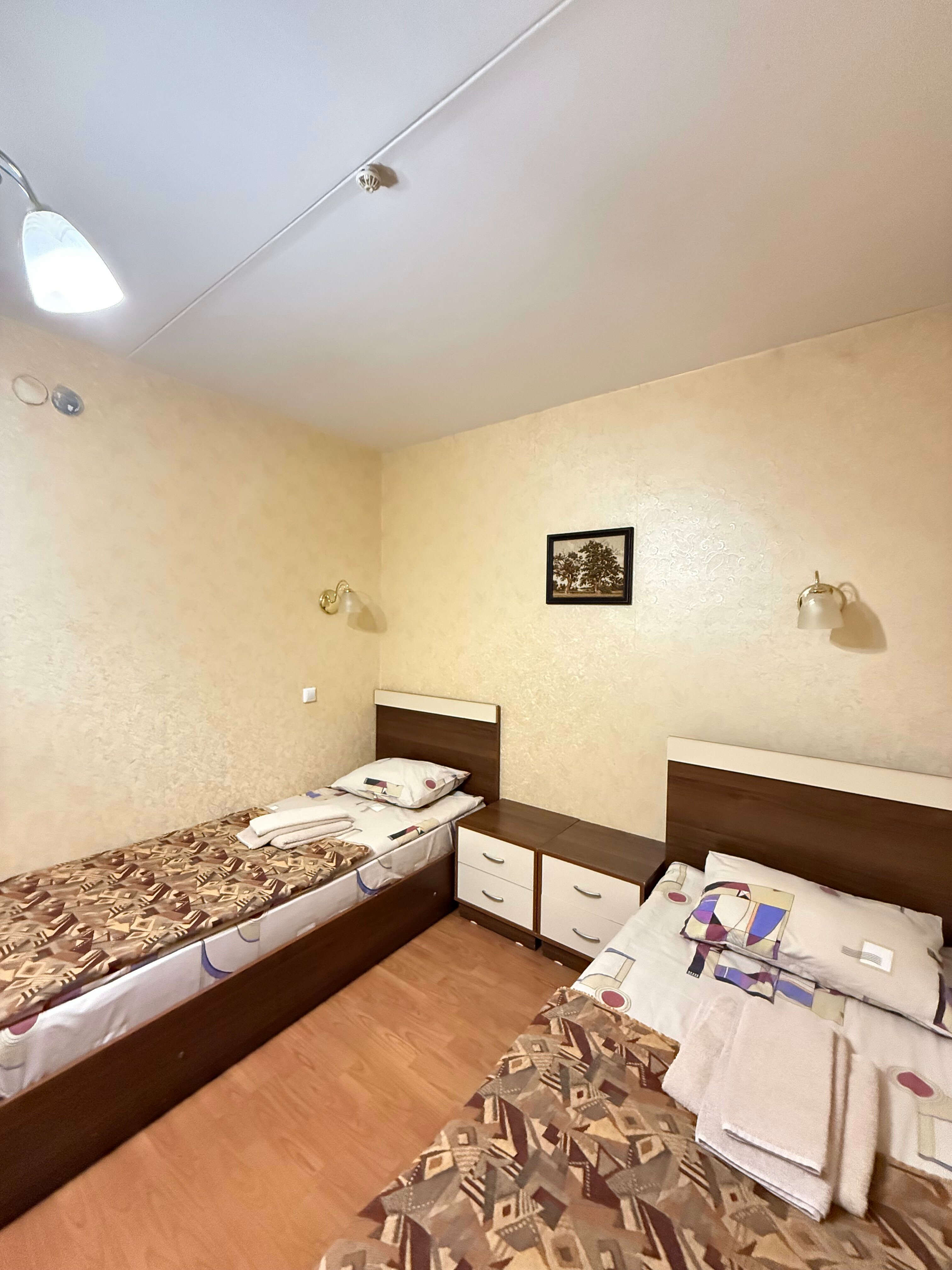 Просторный двухместный номер с 2 отдельными кроватями