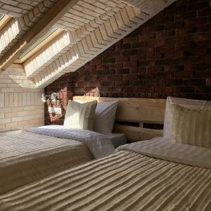 Номер первой категории "Стандарт" с 2 отдельными кроватями "Мансарда"