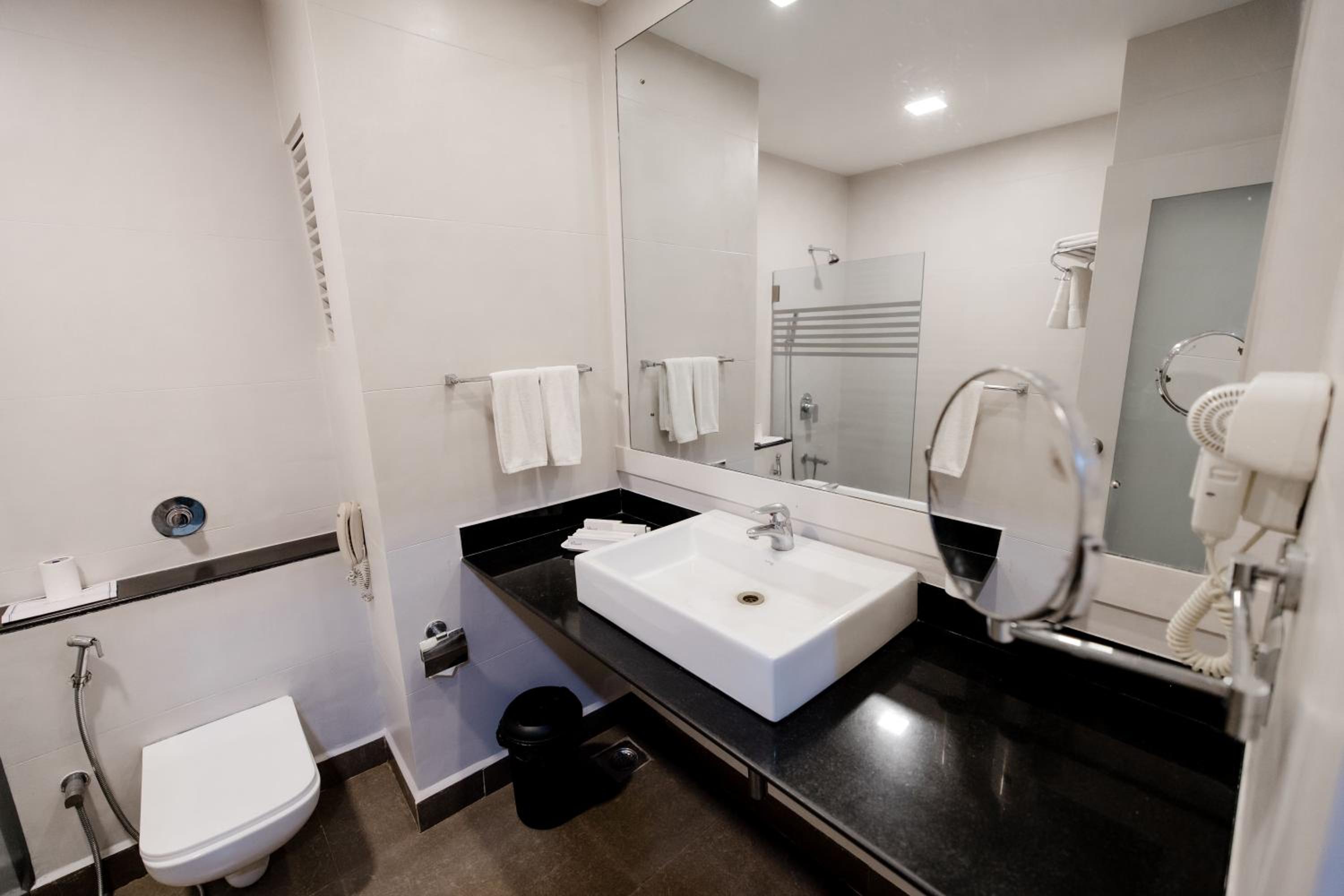 Deluxe pool view room with balcony	