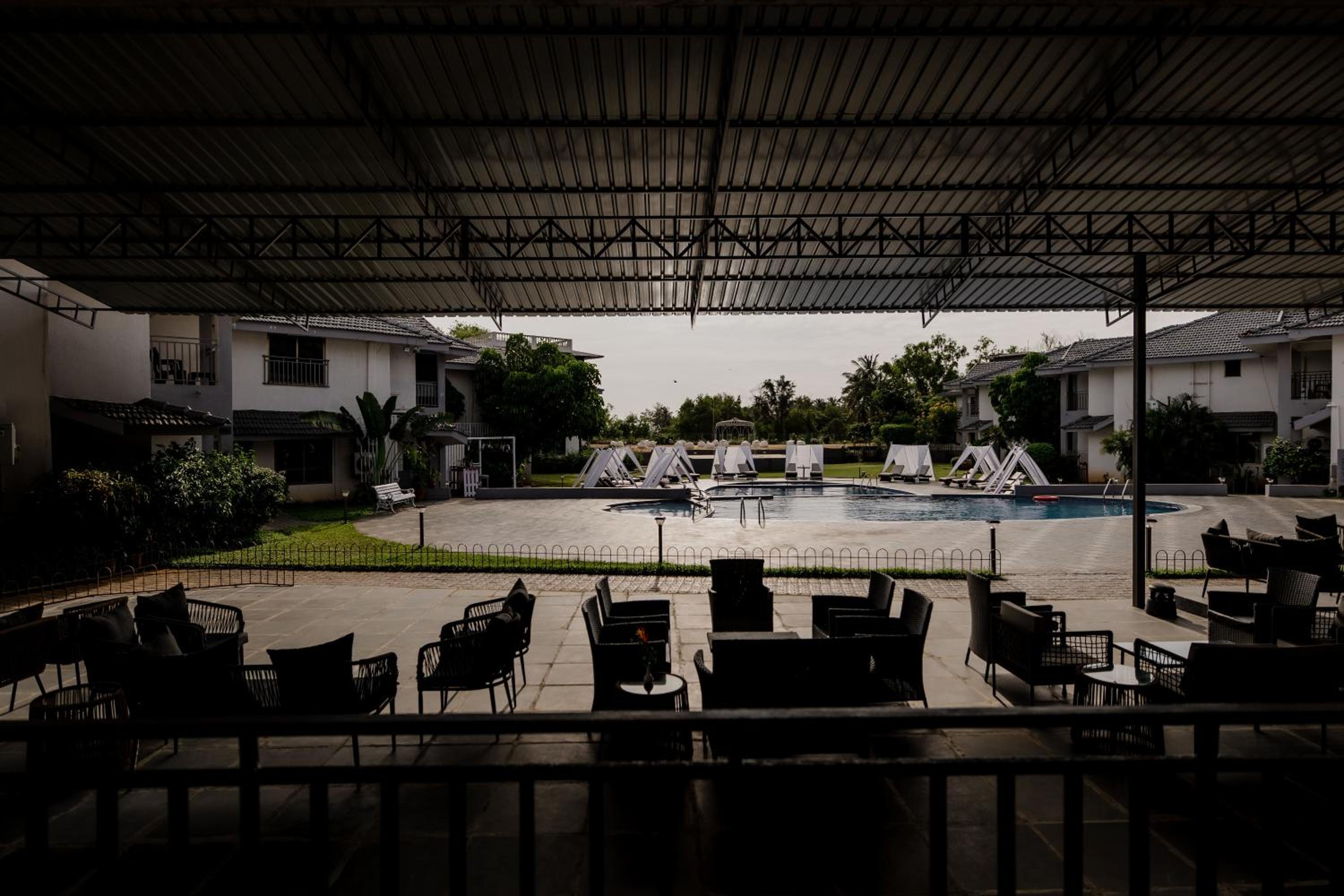 Deluxe pool view room with balcony	