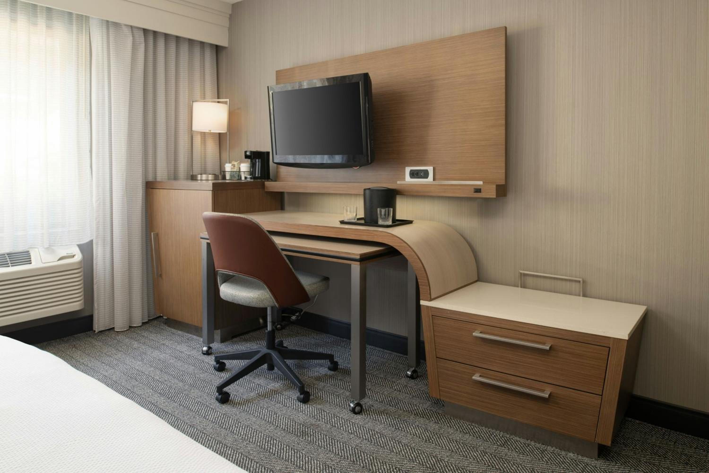 King Room with Sofa Bed and Roll-in Shower - Mobility and Hearing Accessible