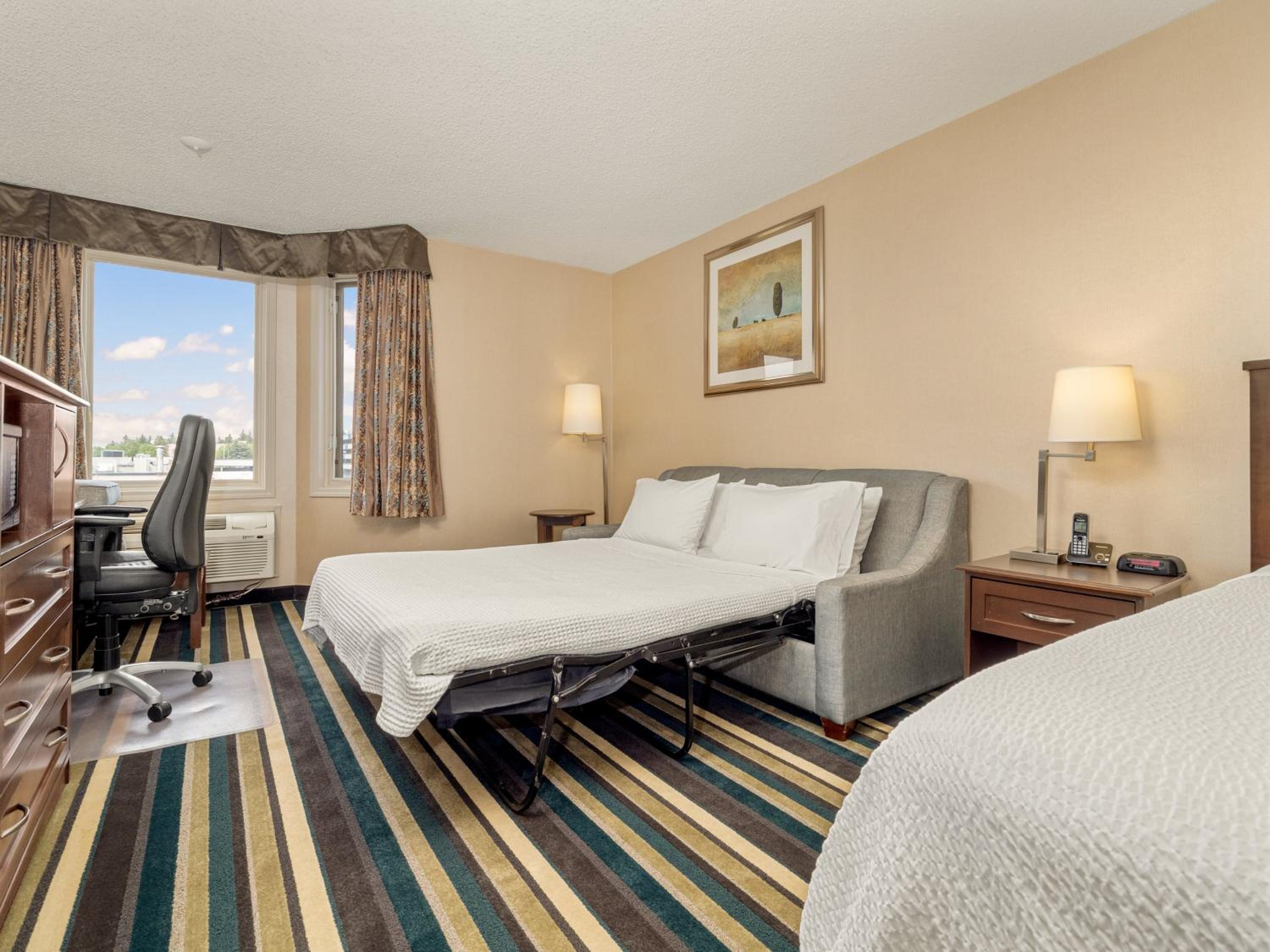 Standard Queen Room with Sofa Bed and City View