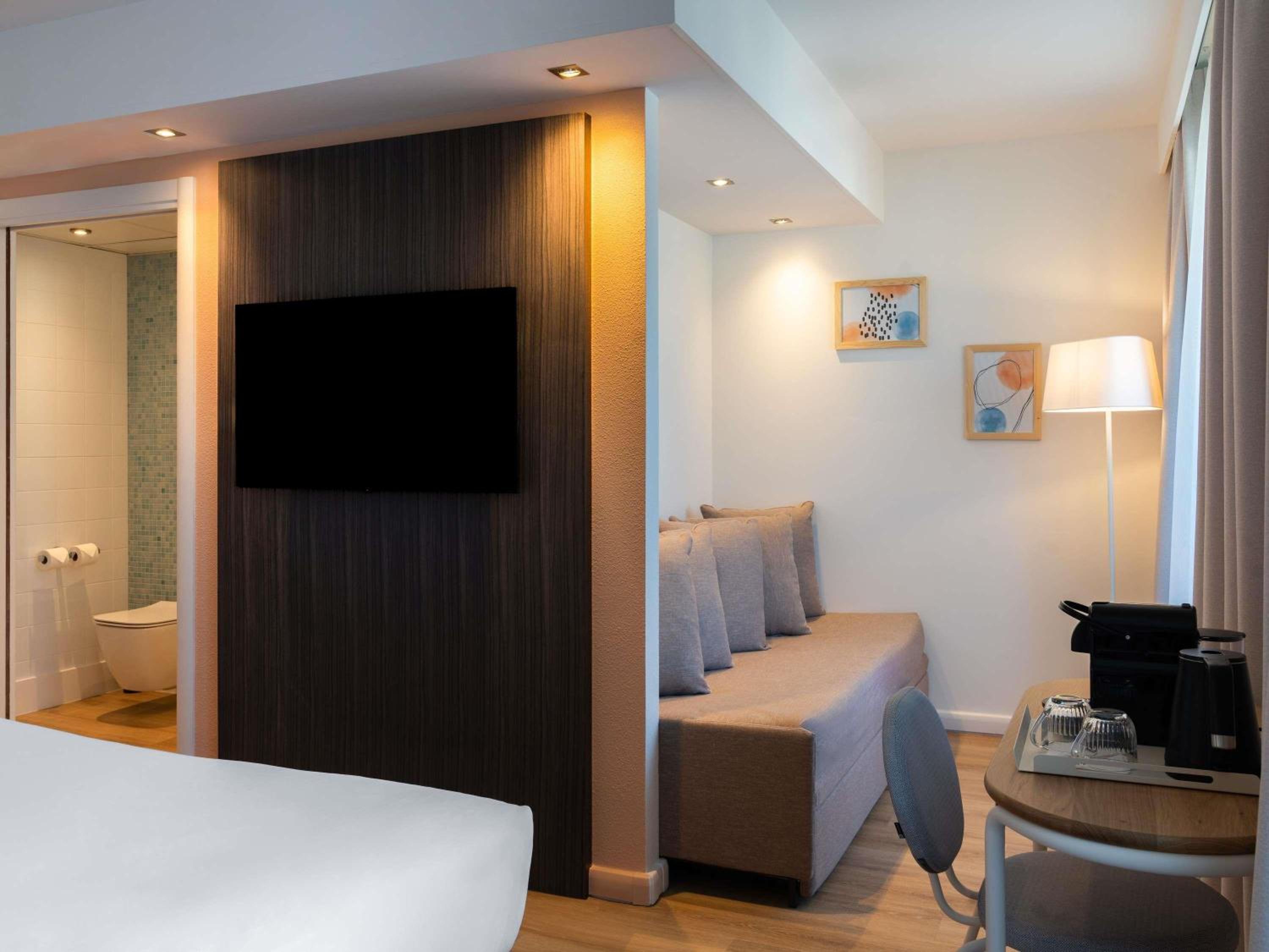 Junior Queen Suite with a Double Sofa Bed and Balcony