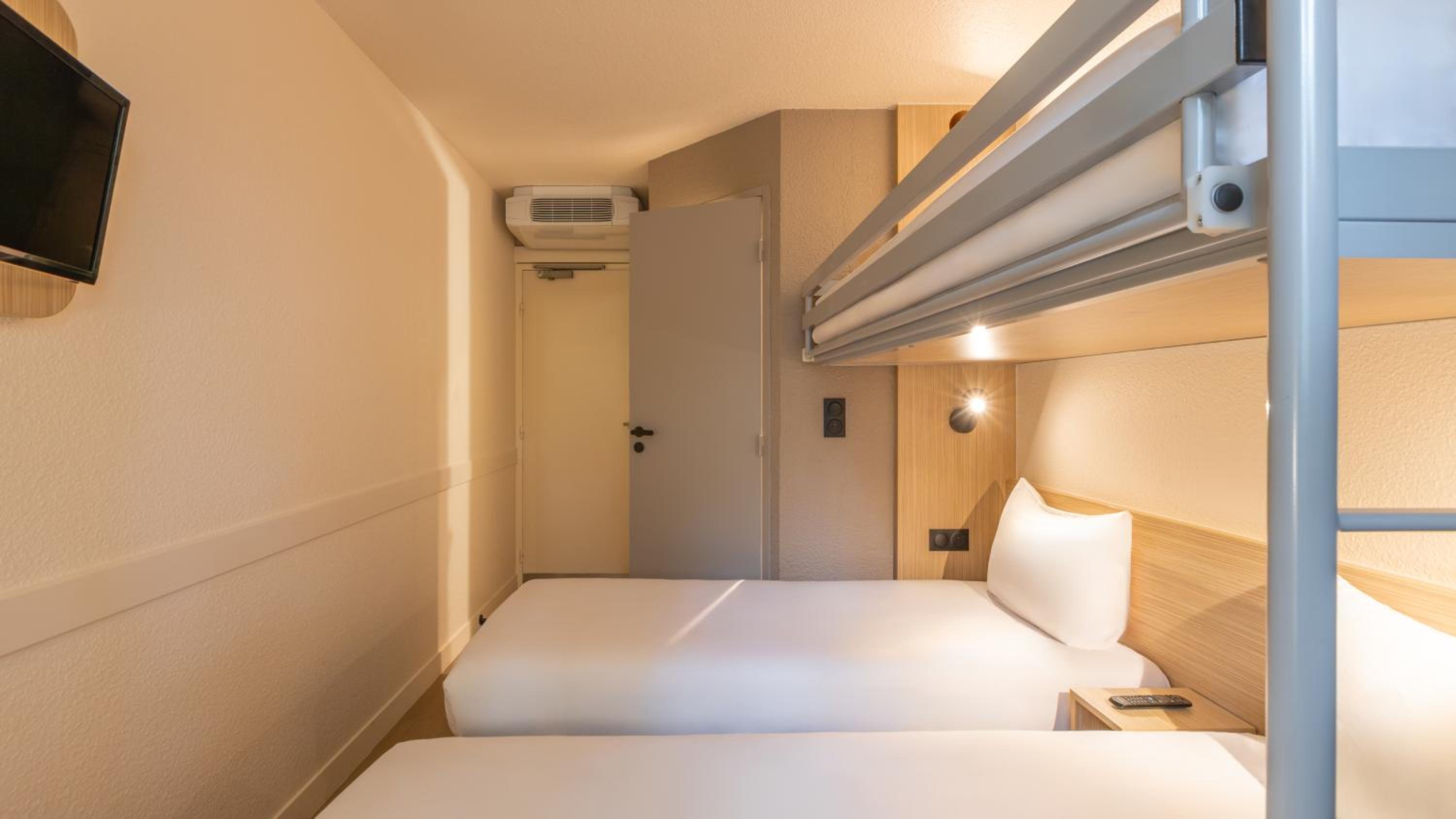 Standard Room with Two Single Beds and One Bunk Bed