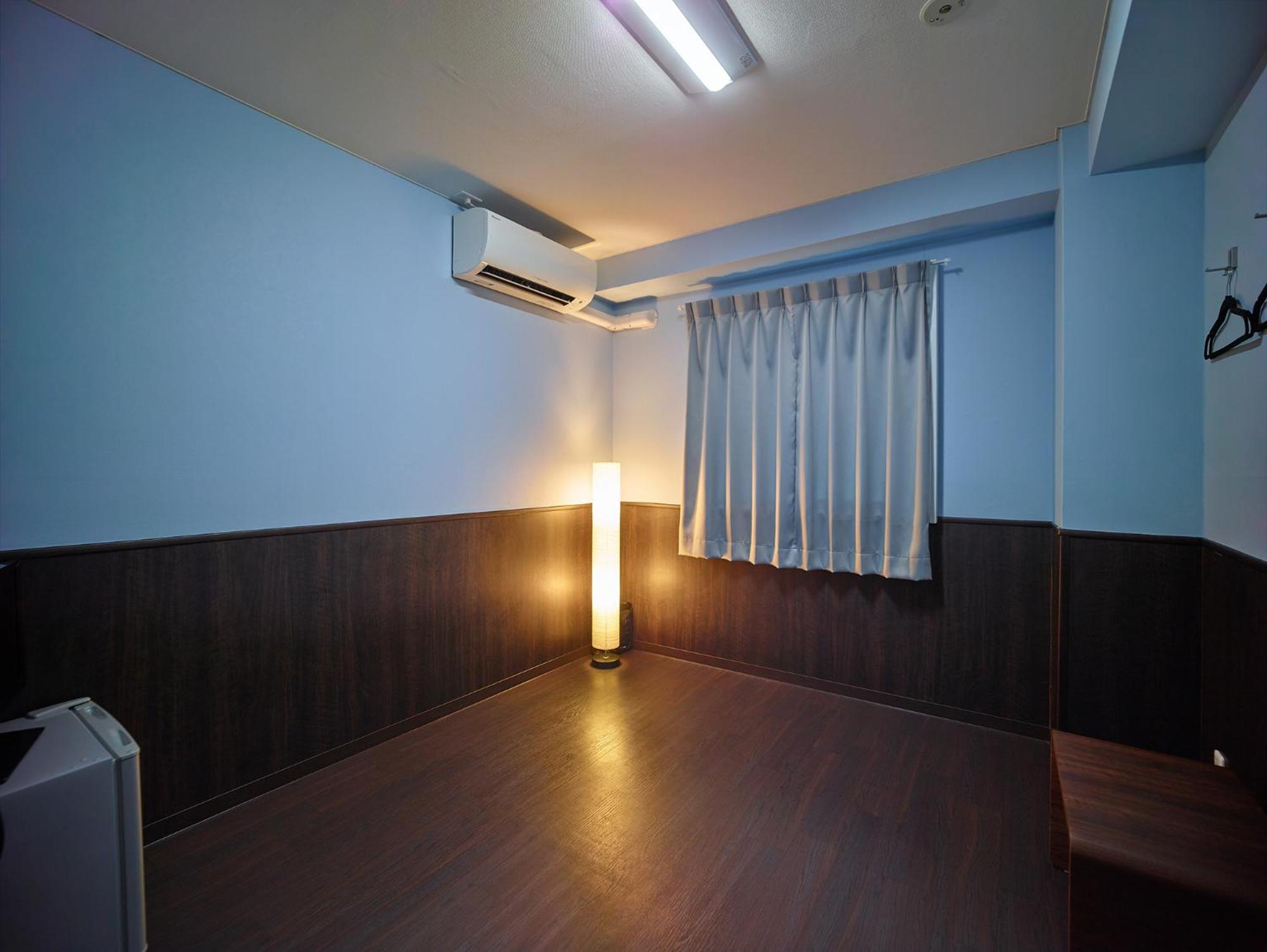 Economy Triple Room with Shared Bathroom