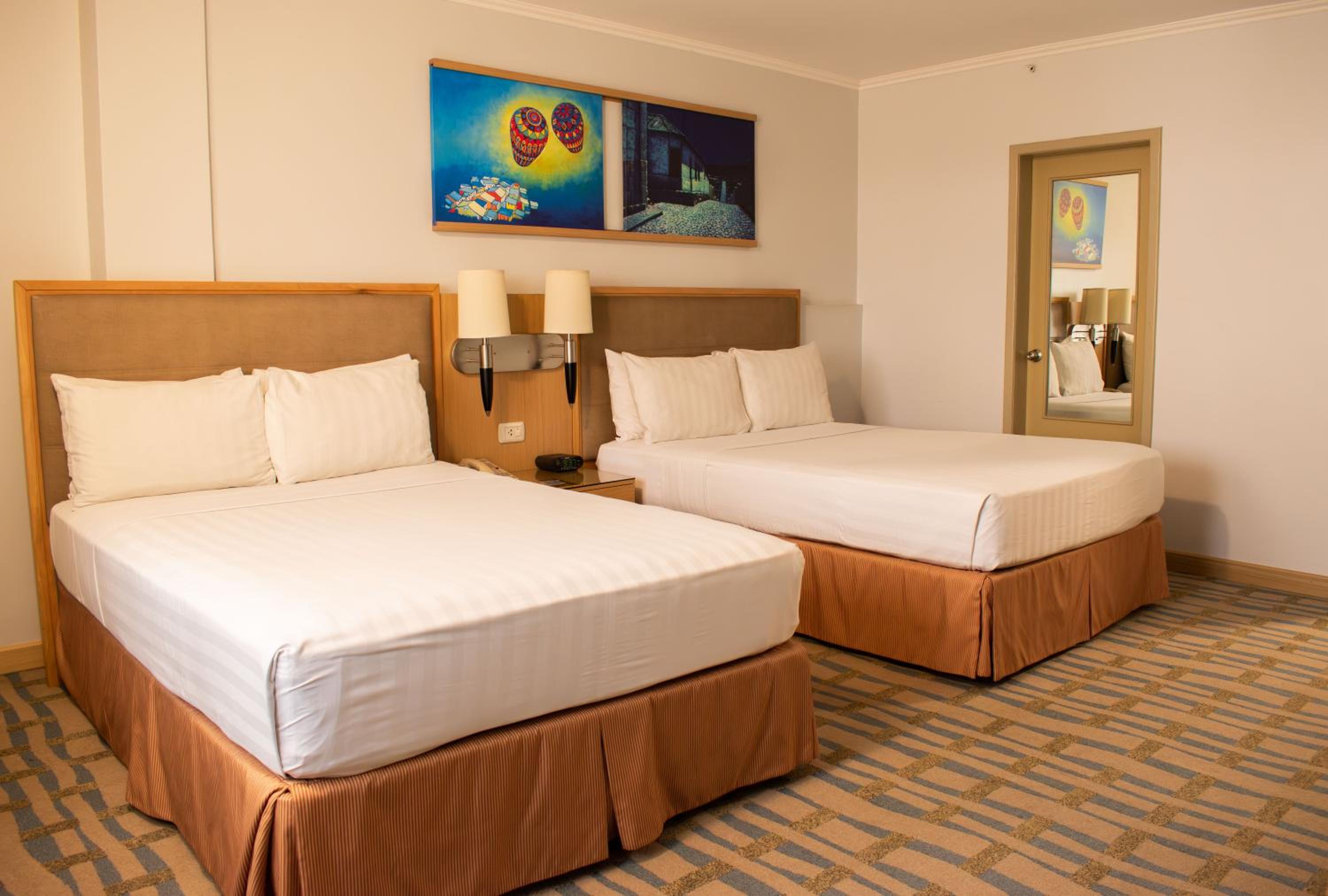 Deluxe Queen Room with One Queen and One Double Bed - Non-Smoking