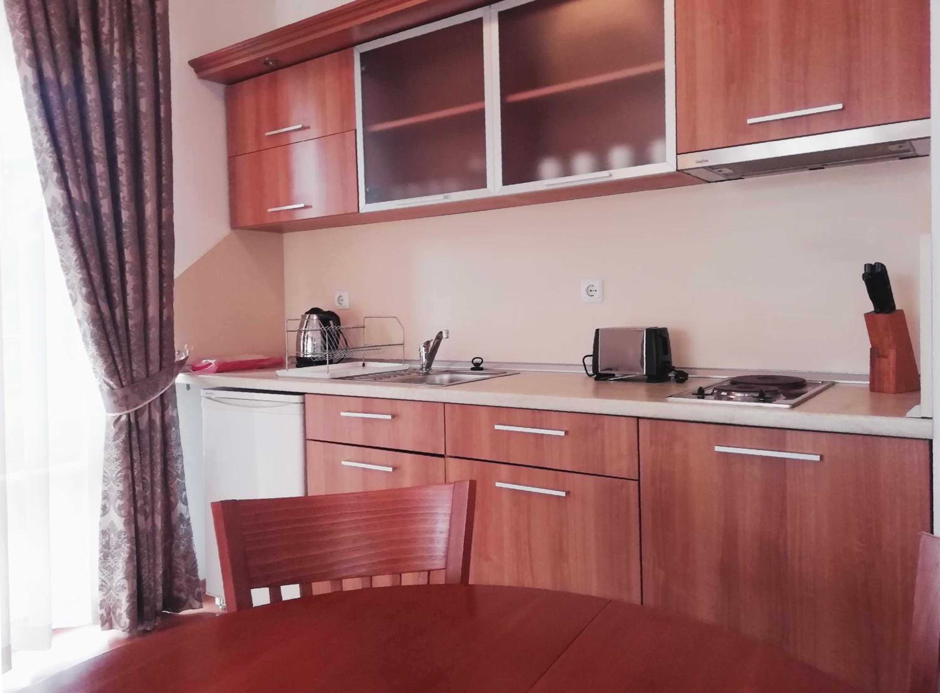 One-Bedroom Apartment with Balcony (2 Adults + 2 Children)
