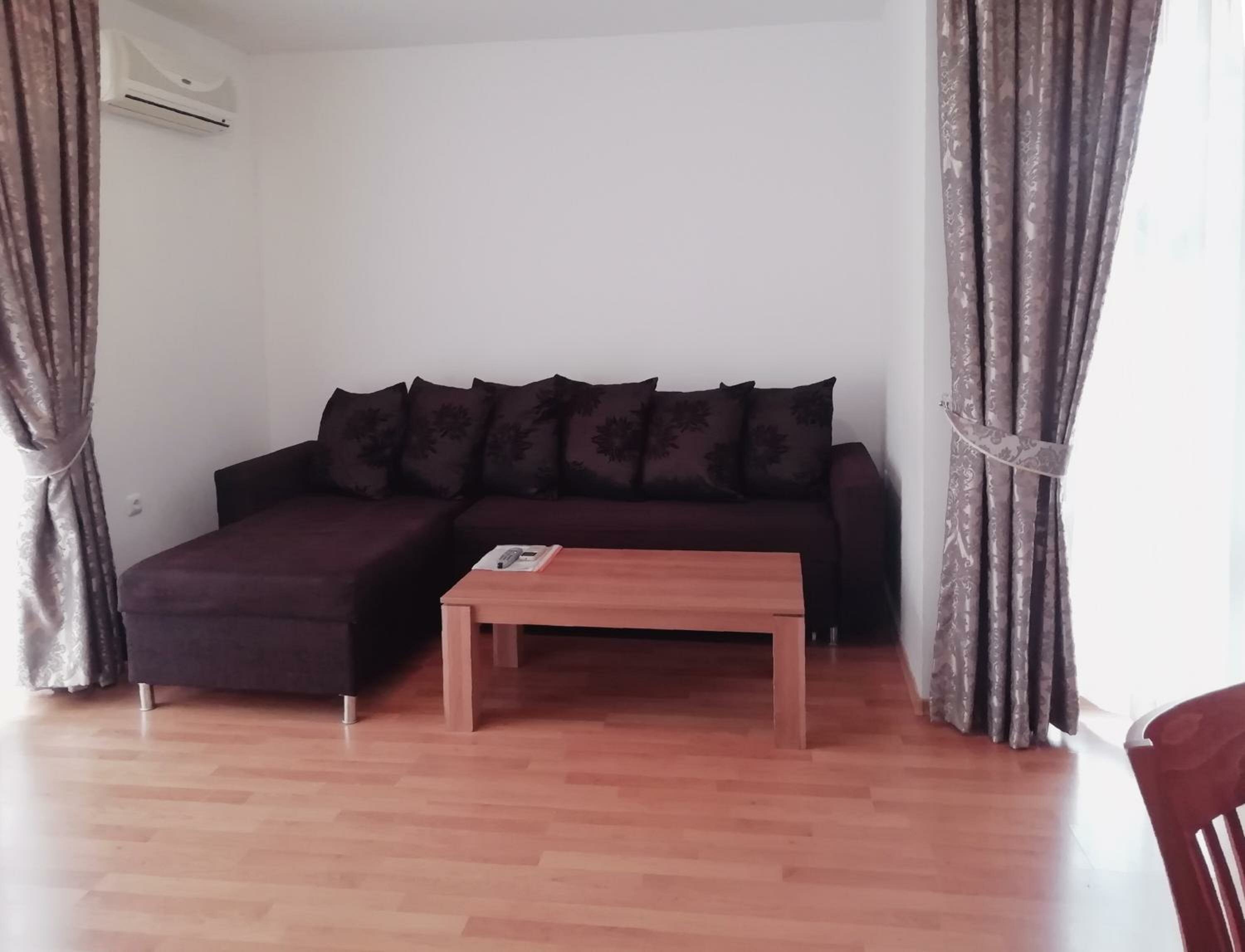 One-Bedroom Apartment with Balcony (2 Adults + 2 Children)