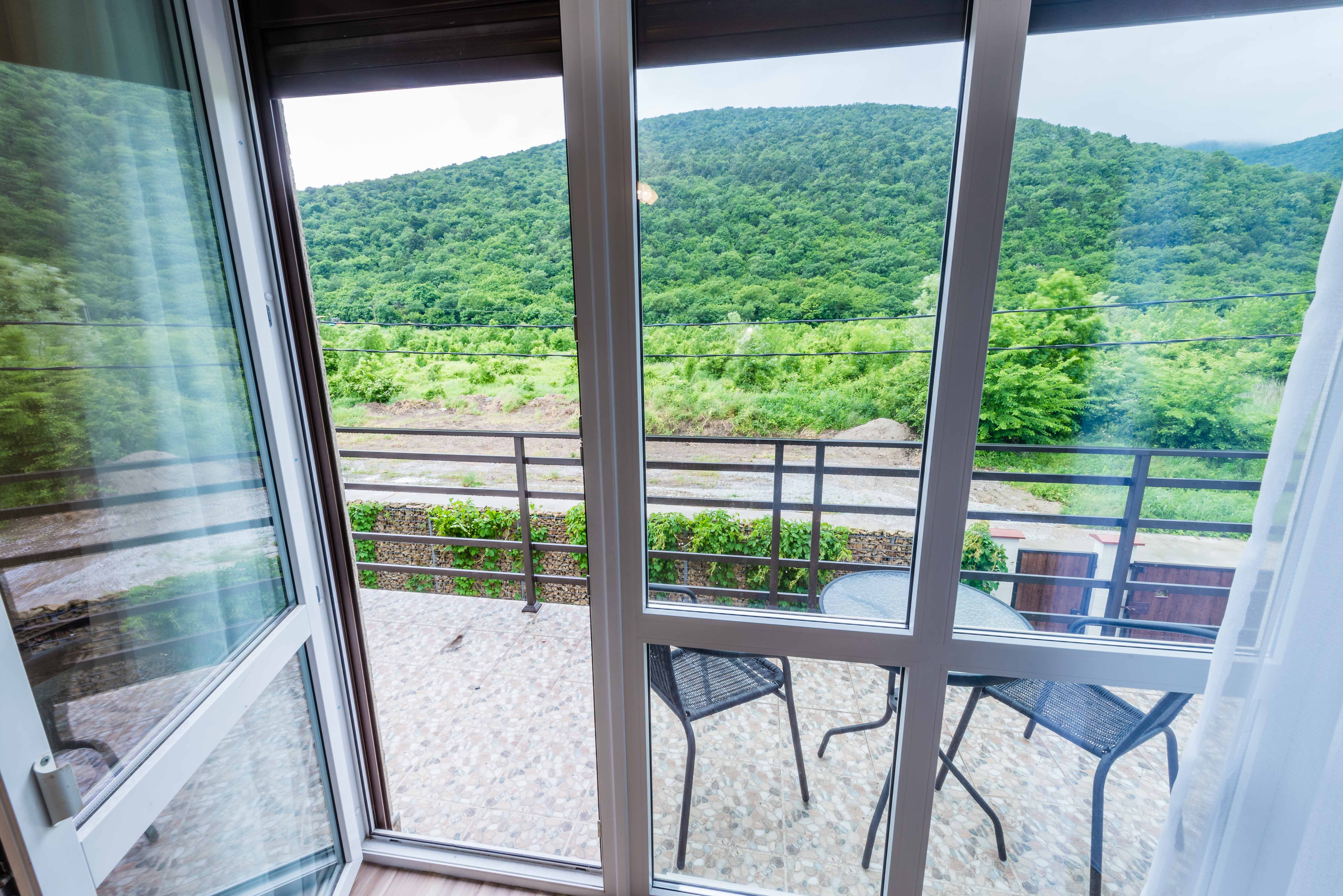 Трехместный номер с балконом