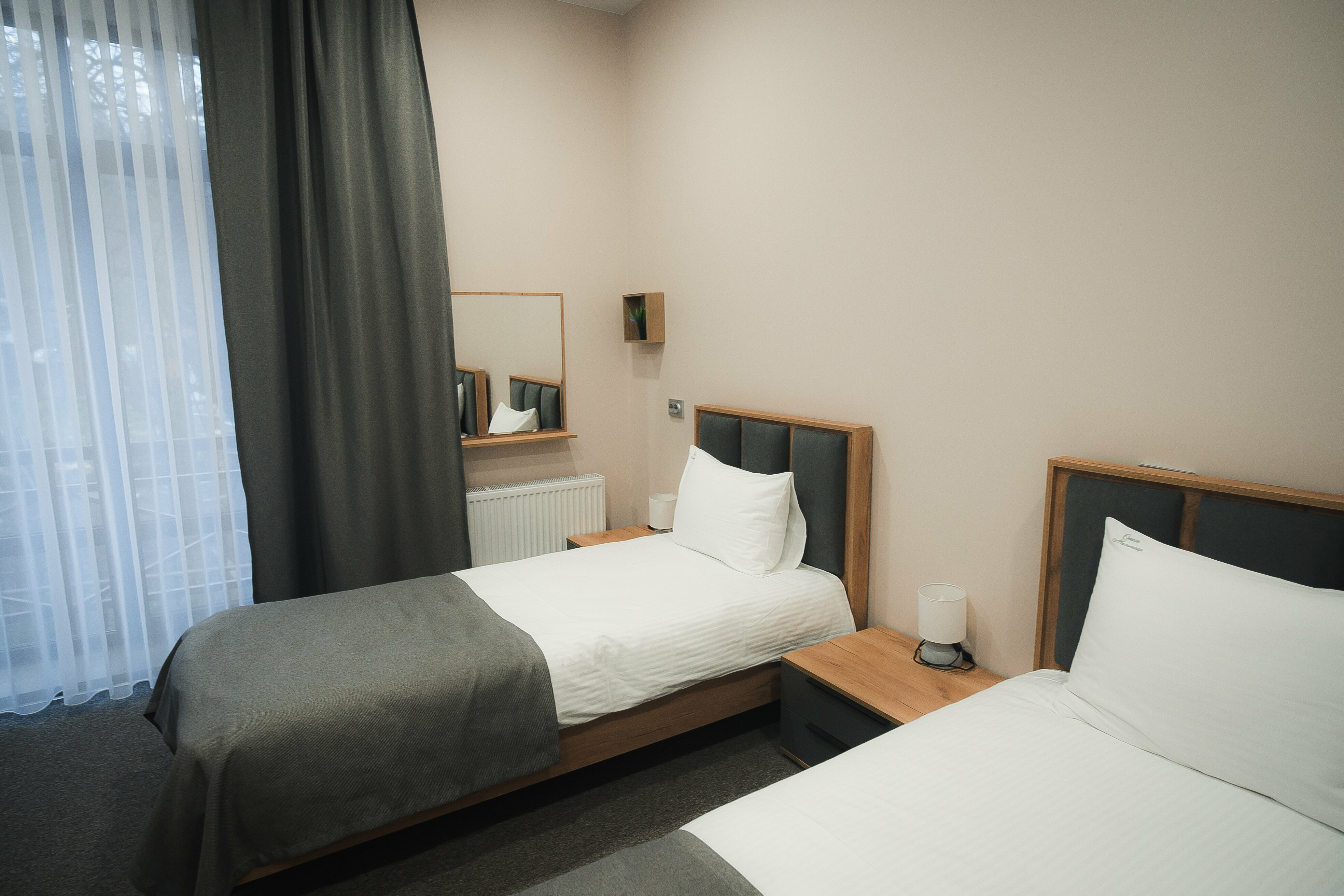 Просторный двухместный номер с 2 отдельными кроватями