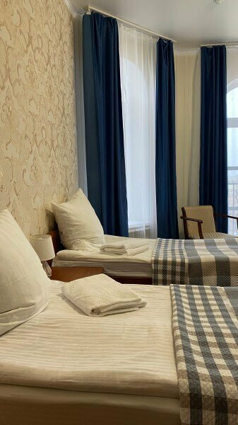 Трехместный номер с видом на сад