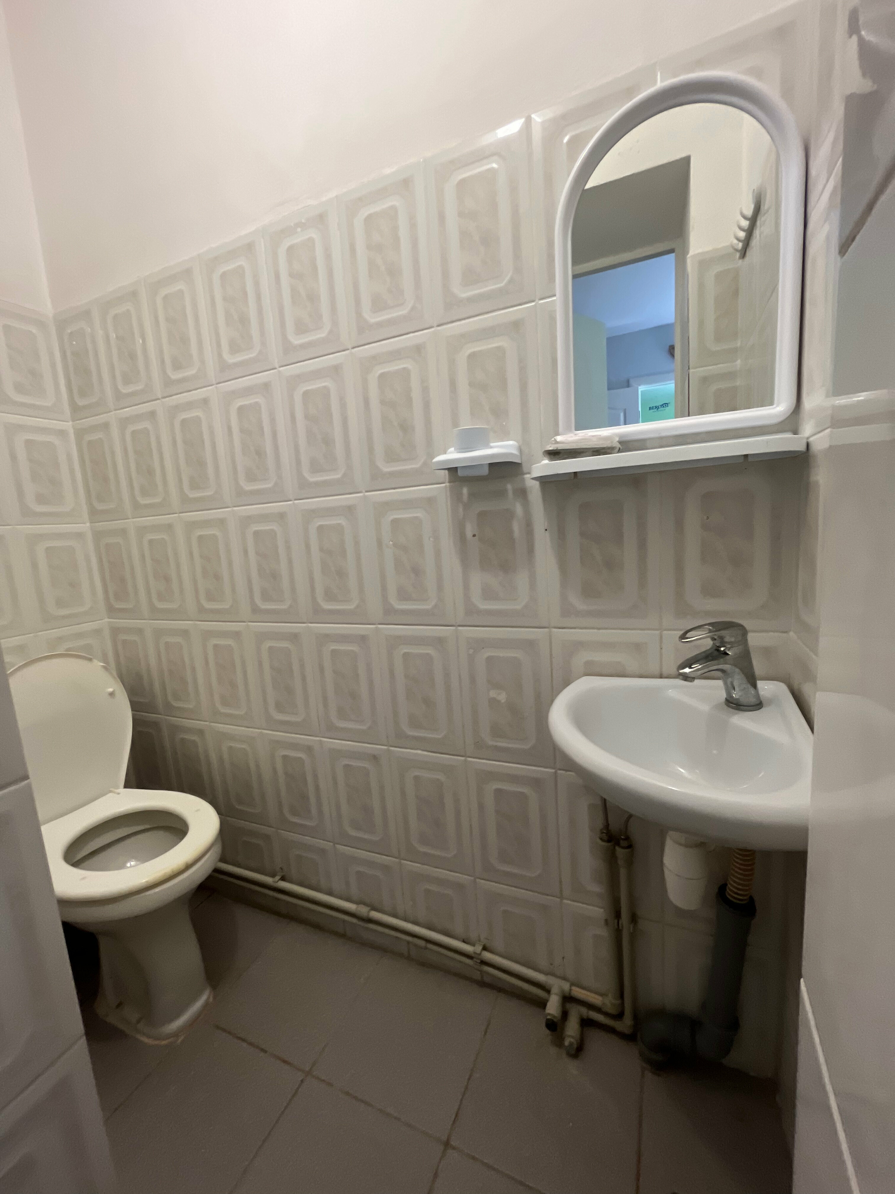 Четырехместный номер с видом на сад