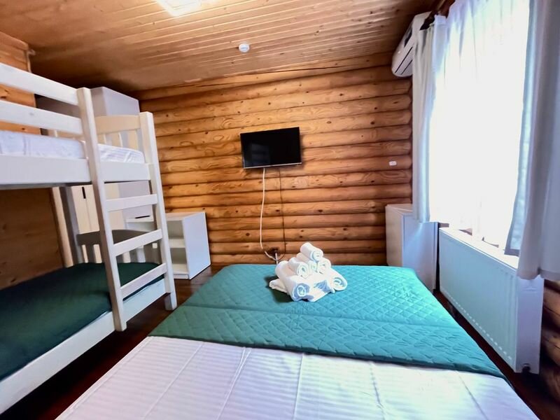 Четырехместный номер Делюкс