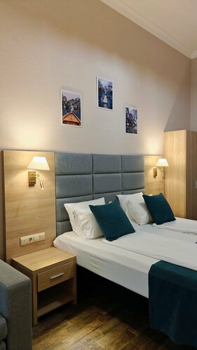 2 этаж I Студия (трёхместный номер с кухонным уголком и микроволновой печью)