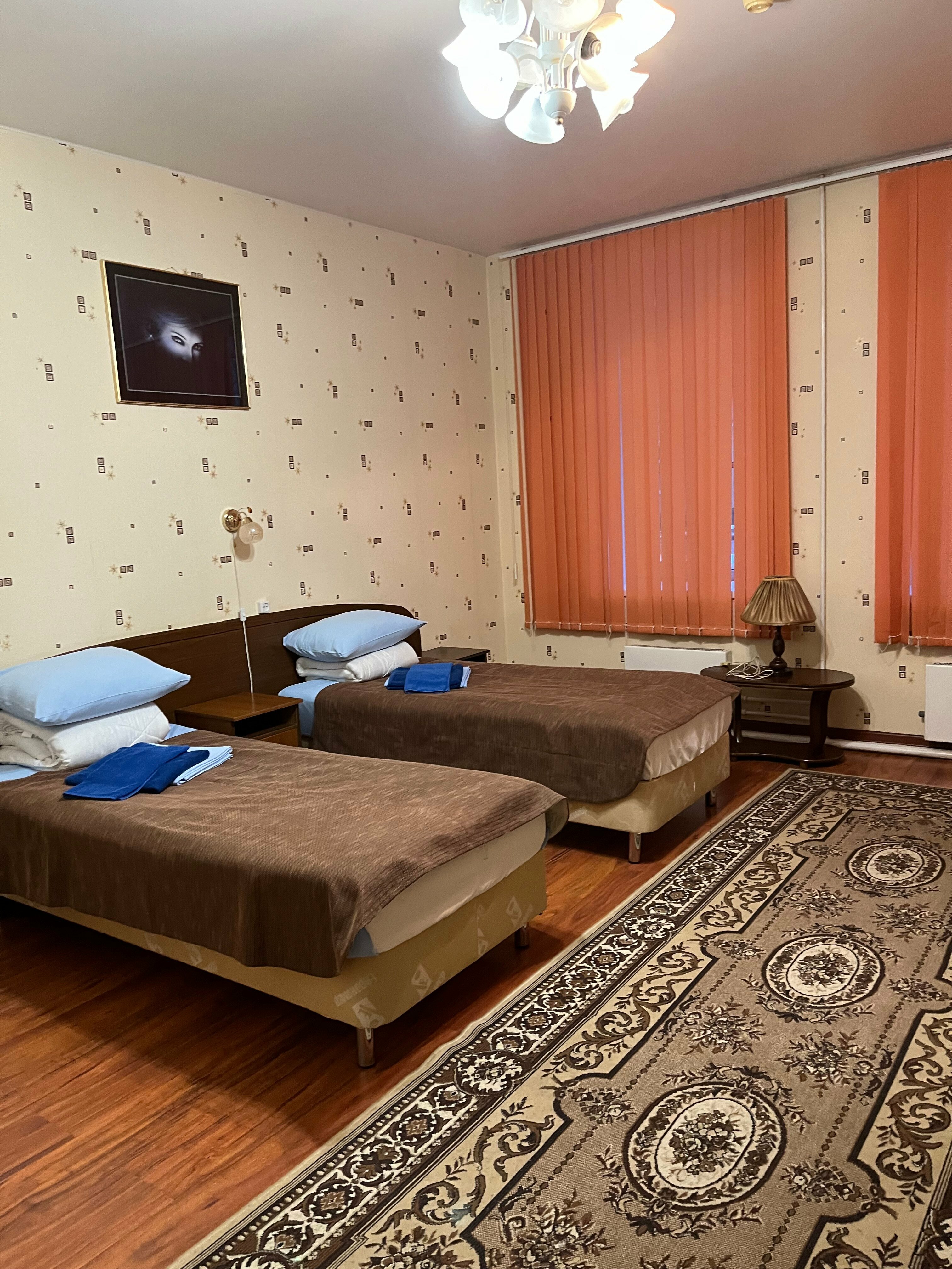 Улучшенный двухместный номер с 2 отдельными кроватями