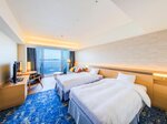 Номер с видом на океан в новом здании Aqua Square в Atami Korakuen Hotel