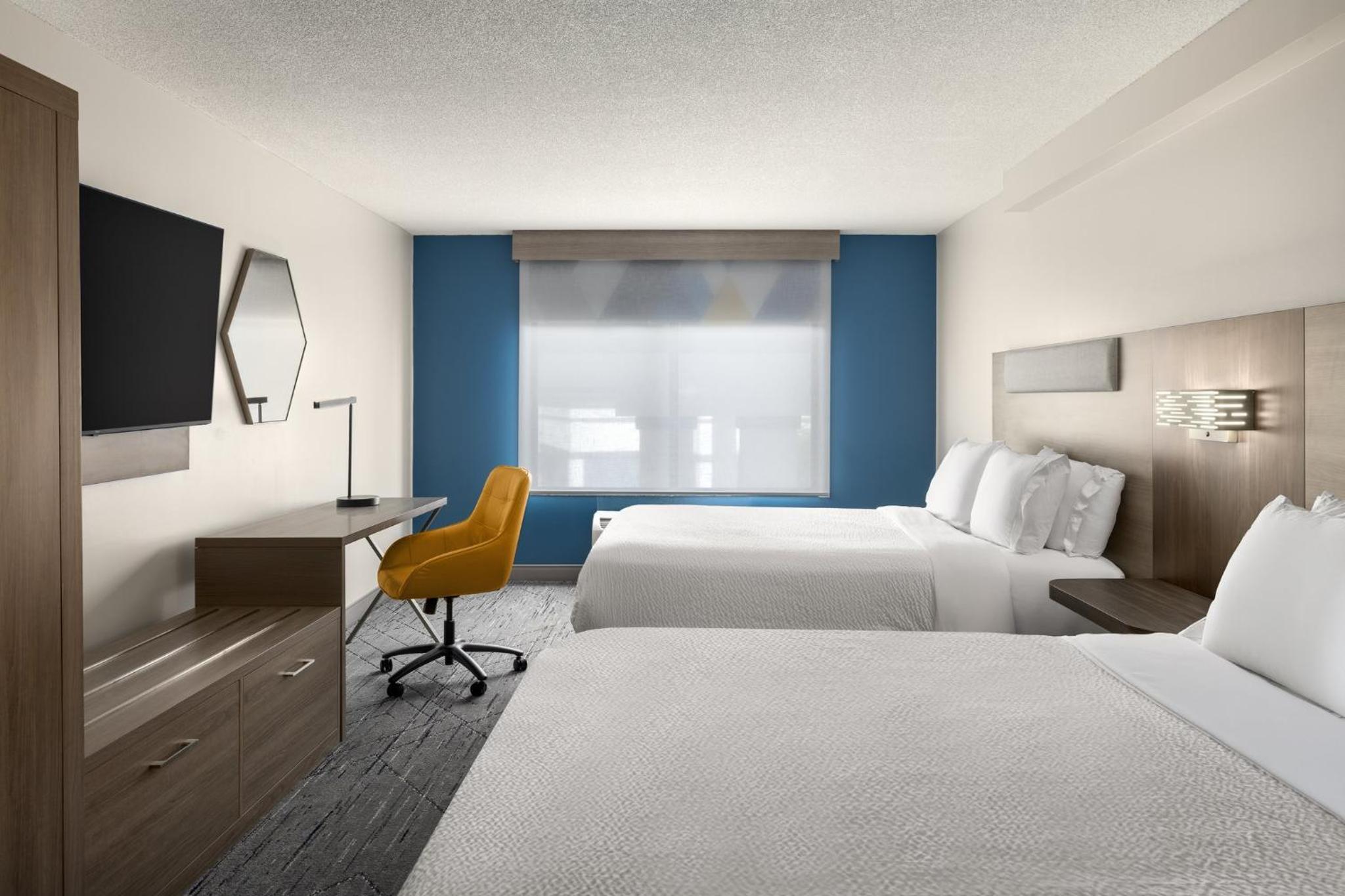 Queen Suite with Two Queen Beds and Sofa Bed