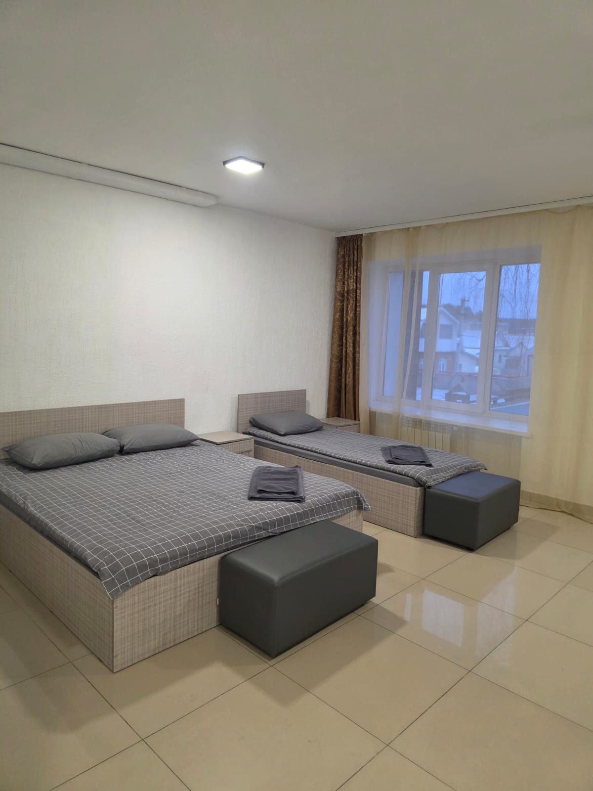 Трехместный номер с собственной ванной комнатой